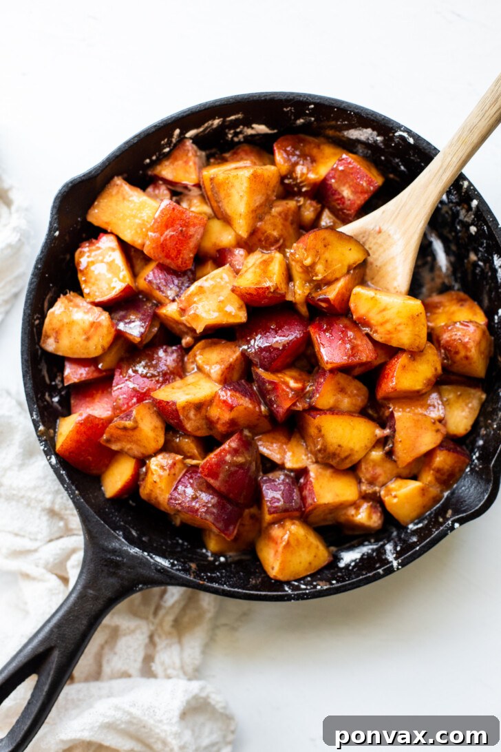 Adding solid coconut oil to the dry topping ingredients.