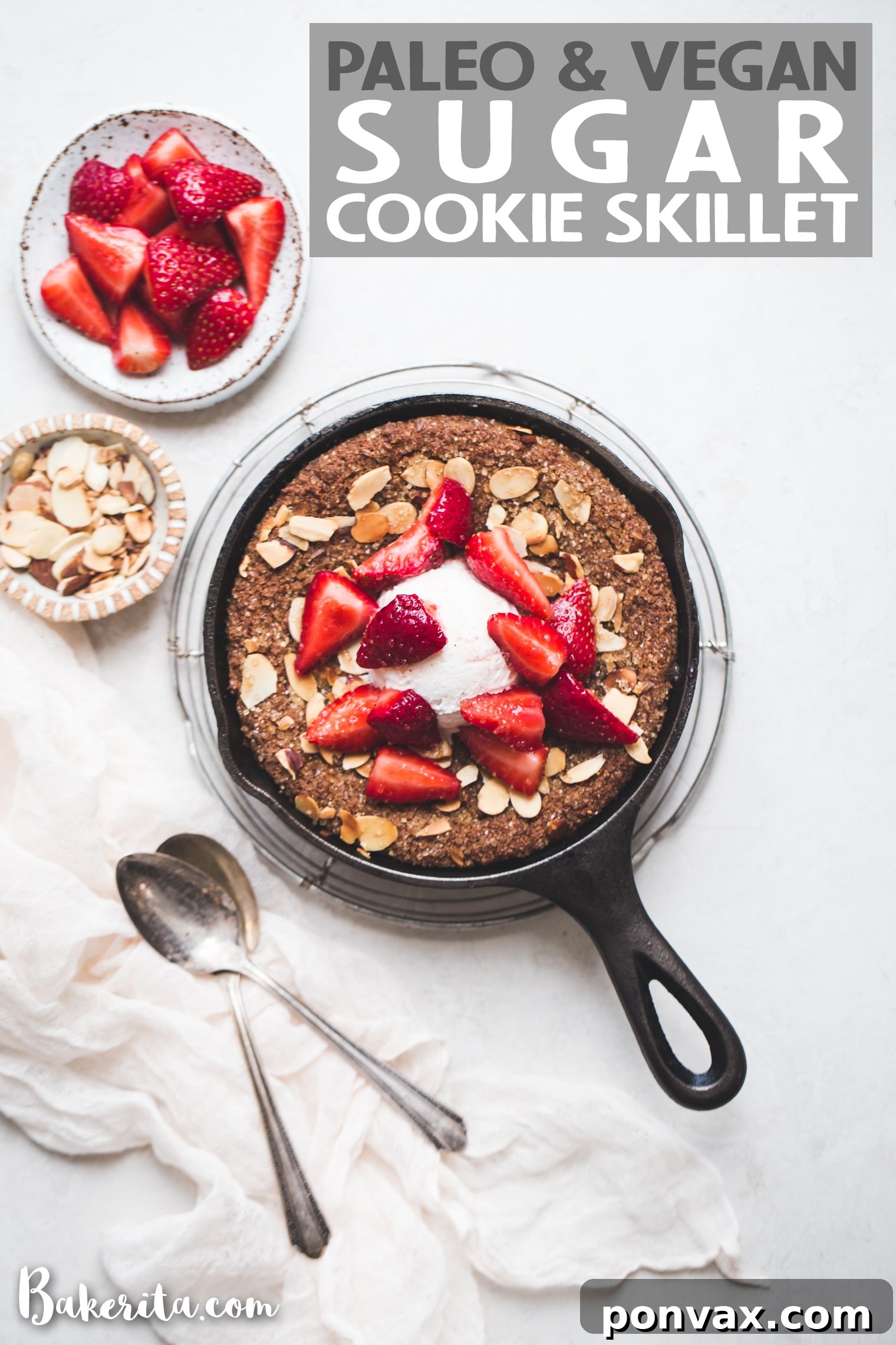 A close-up of a serving of the Gluten-Free & Vegan Sugar Cookie Skillet, emphasizing the gooey center and almond topping.