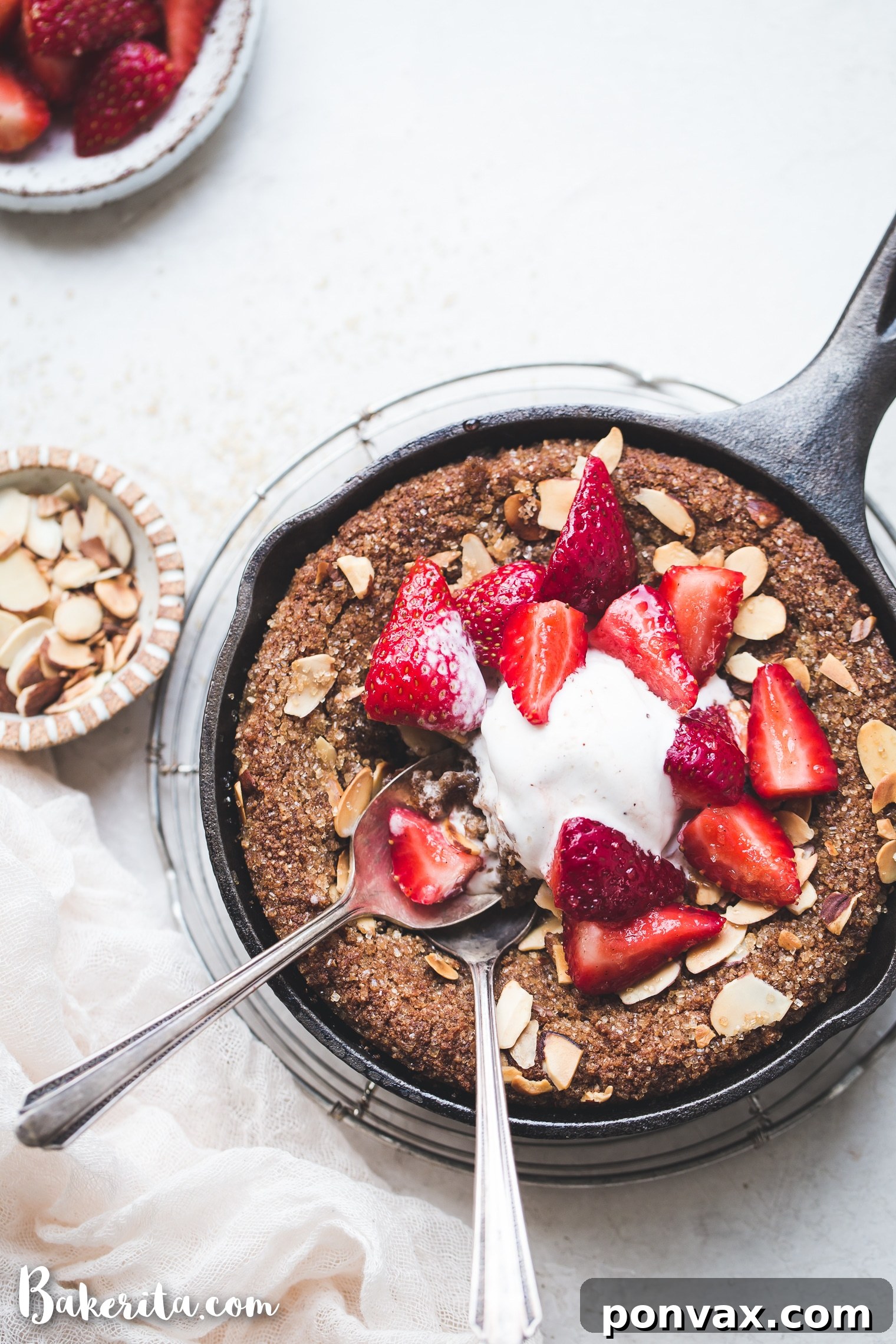Close-up of the warm, gooey center of a freshly baked Gluten-Free & Vegan Sugar Cookie Skillet, inviting a spoon to dive in.