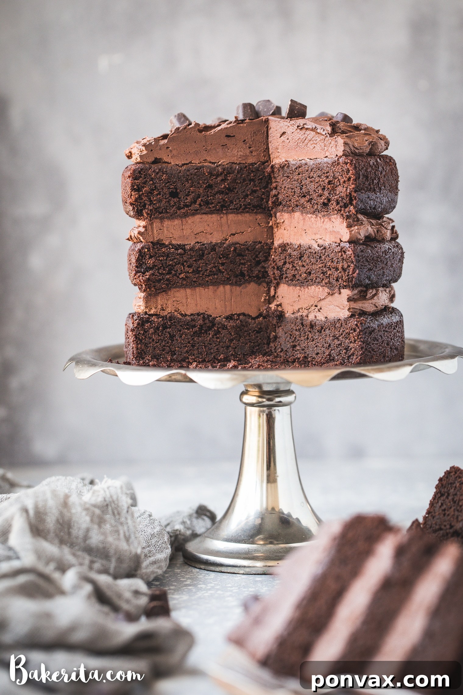 Assortment of dry ingredients for paleo chocolate cake including almond flour, tapioca flour, coconut sugar, and cacao powder, ready for mixing.