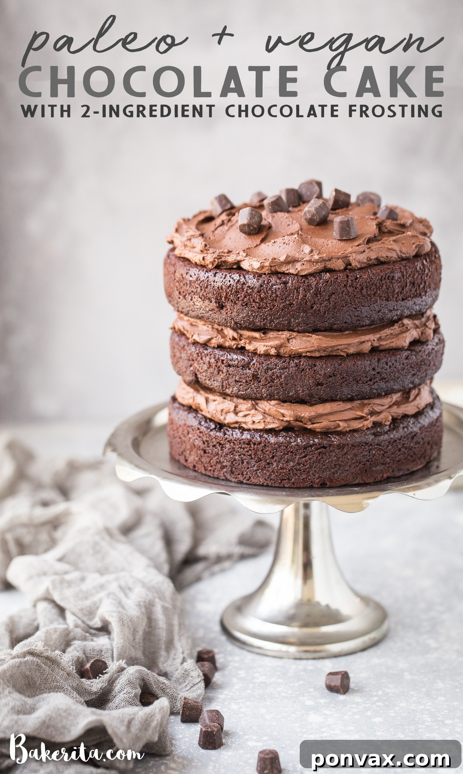 Overhead shot of a delicious paleo chocolate cake with whipped vegan frosting, ready for serving.