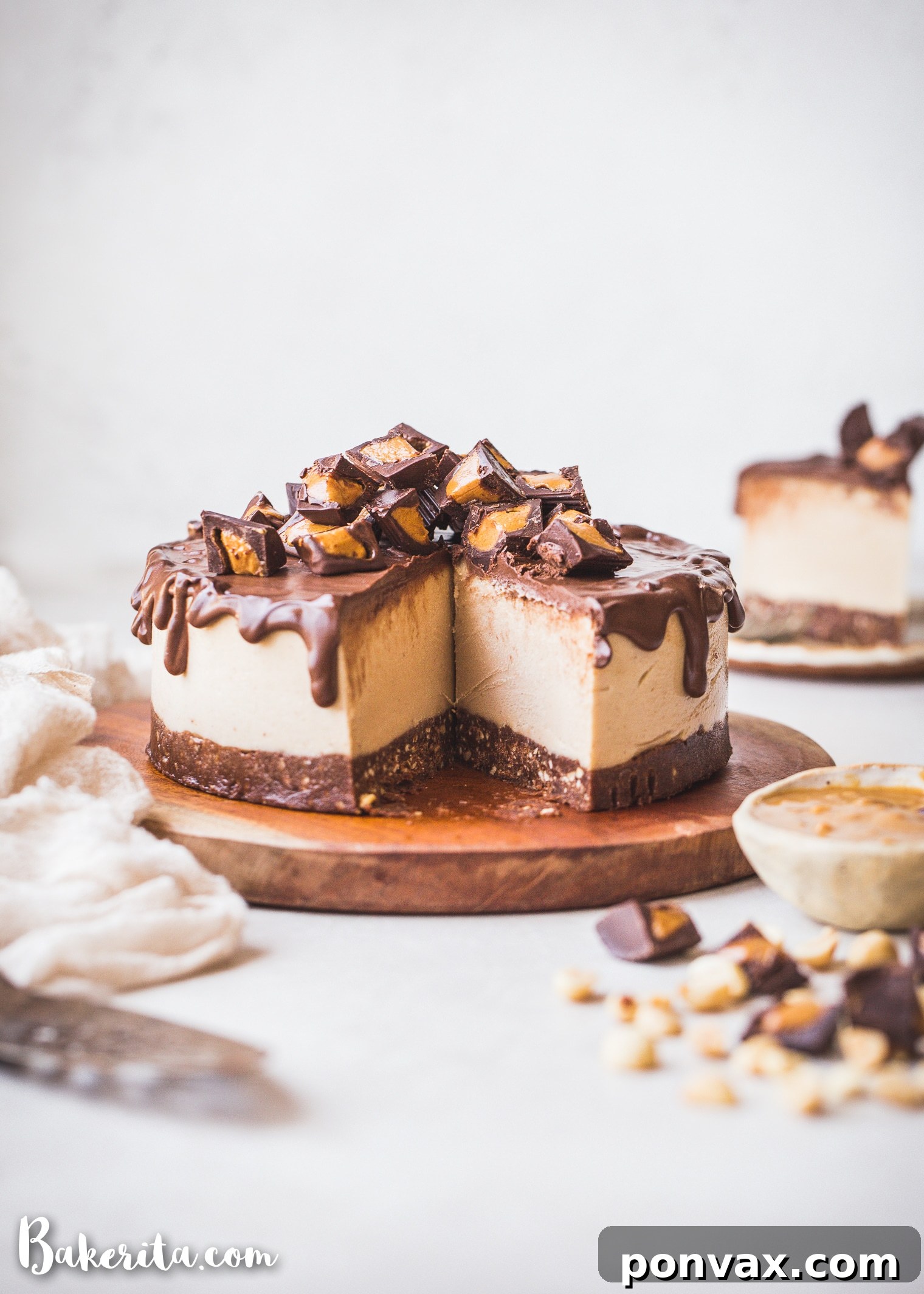 Indulgent Vegan Peanut Butter Cup Cheesecake 2 This Gluten-Free Vegan Peanut Butter Cup Cheesecake tastes like your favorite candy turned into a delightfully creamy vegan cheesecake. With a chocolate crust, creamy peanut butter filling, and chocolate ganache topping, you won't be able to have just one bite!