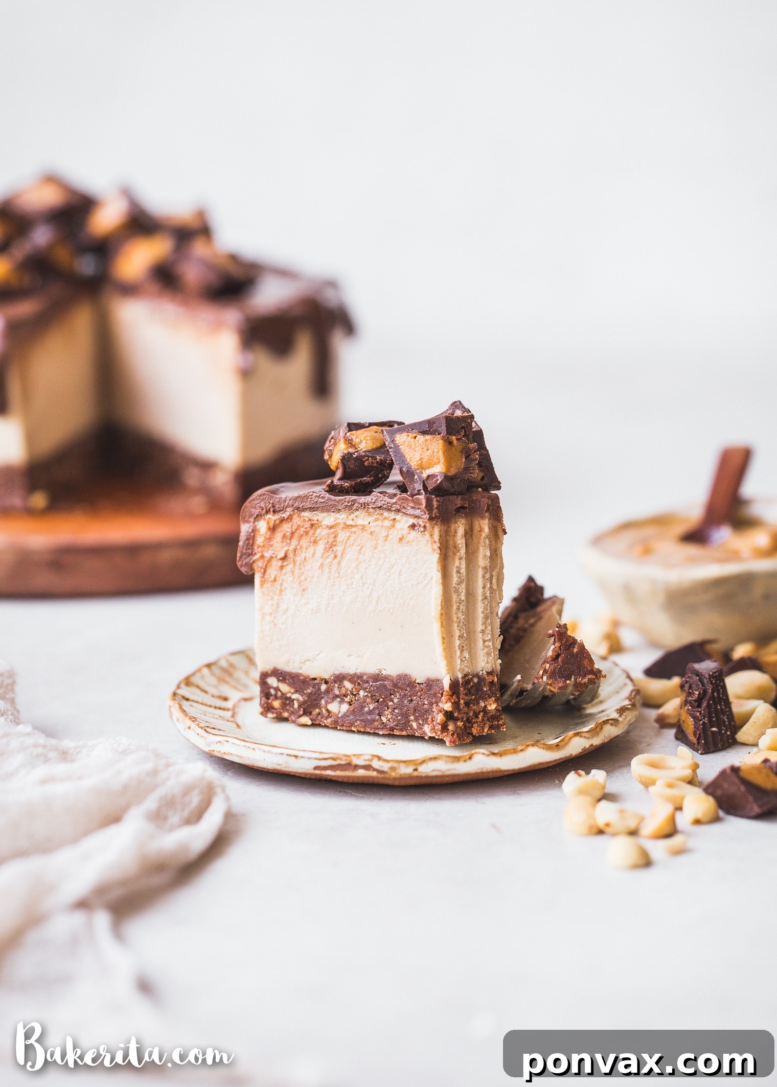 Indulgent Vegan Peanut Butter Cup Cheesecake 3 This Gluten-Free Vegan Peanut Butter Cup Cheesecake tastes like your favorite candy turned into a delightfully creamy vegan cheesecake. With a chocolate crust, creamy peanut butter filling, and chocolate ganache topping, you won't be able to have just one bite!