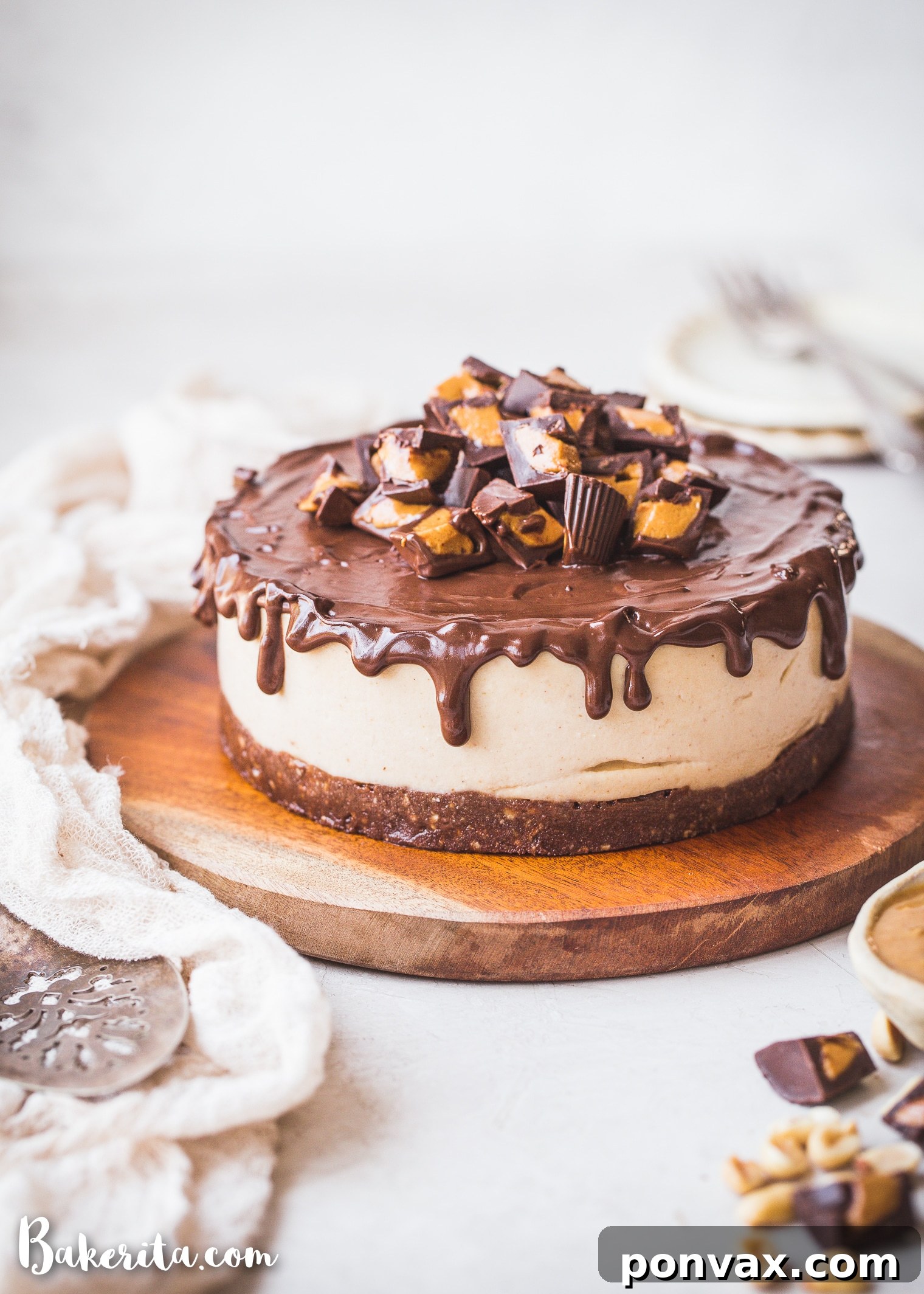 Indulgent Vegan Peanut Butter Cup Cheesecake 4 This Gluten-Free Vegan Peanut Butter Cup Cheesecake tastes like your favorite candy turned into a delightfully creamy vegan cheesecake. With a chocolate crust, creamy peanut butter filling, and chocolate ganache topping, you won't be able to have just one bite!