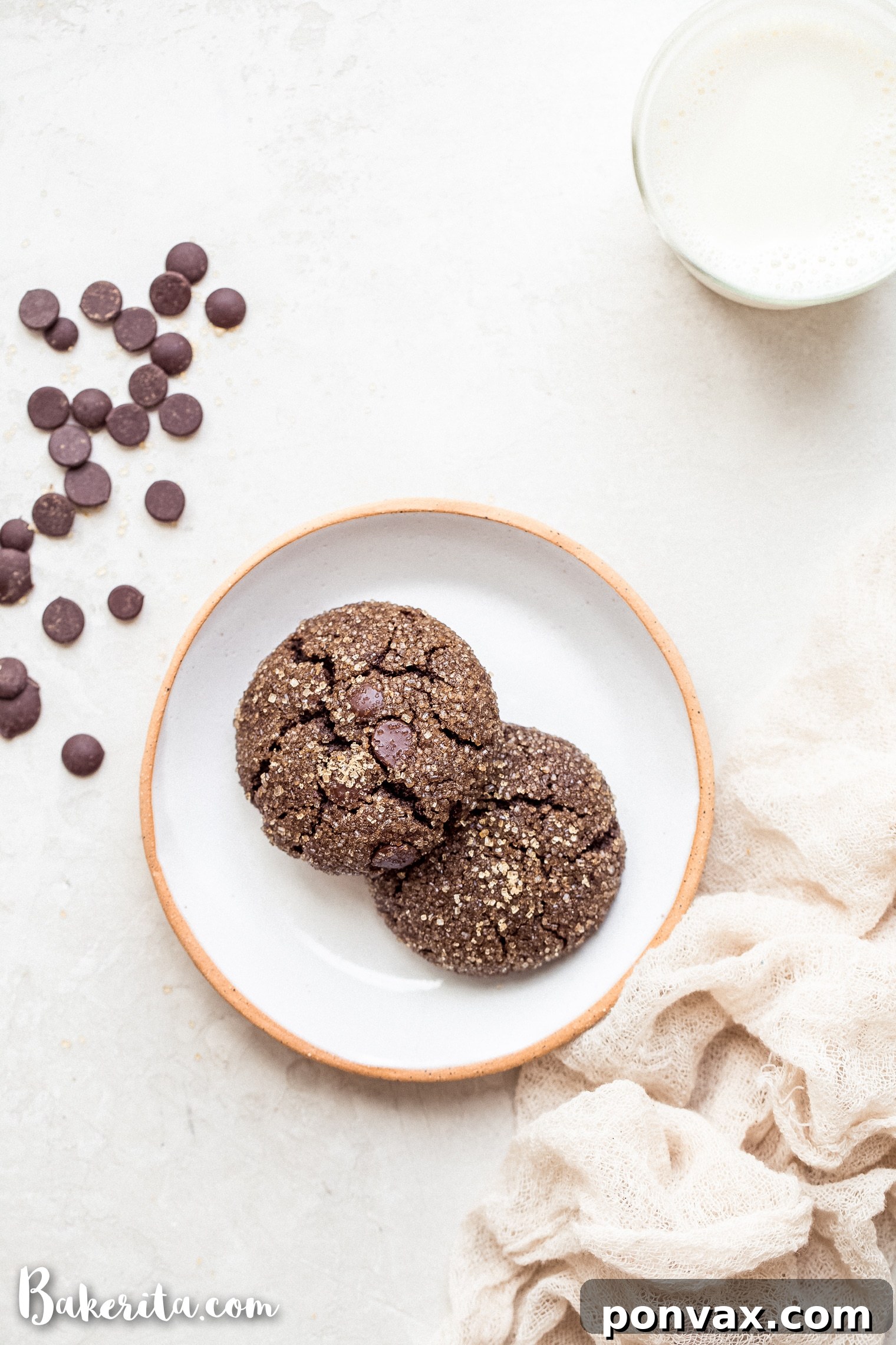 Prepare a double batch of these irresistible Gluten-Free Vegan Chocolate Crinkle Cookies – one to share the joy, and one to savor personally! These paleo-friendly cookies are fantastic for festive events, lunchbox treats, or a delightful simple dessert, crafted quickly and easily.