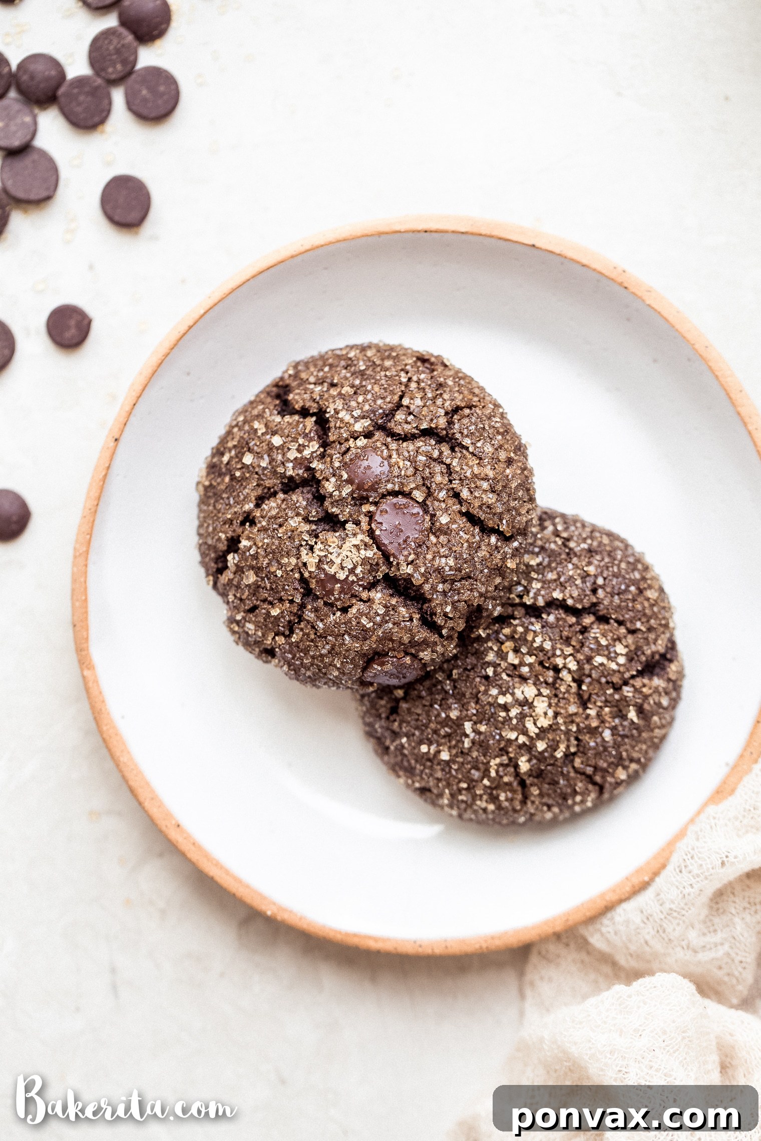 Whip up a generous double batch of these delightful Gluten-Free Vegan Chocolate Crinkle Cookies – ideal for sharing with friends or keeping as your personal stash! These paleo-friendly cookies are a perfect choice for lunchbox surprises, festive celebrations, or an easy everyday dessert, and they're incredibly quick to prepare.
