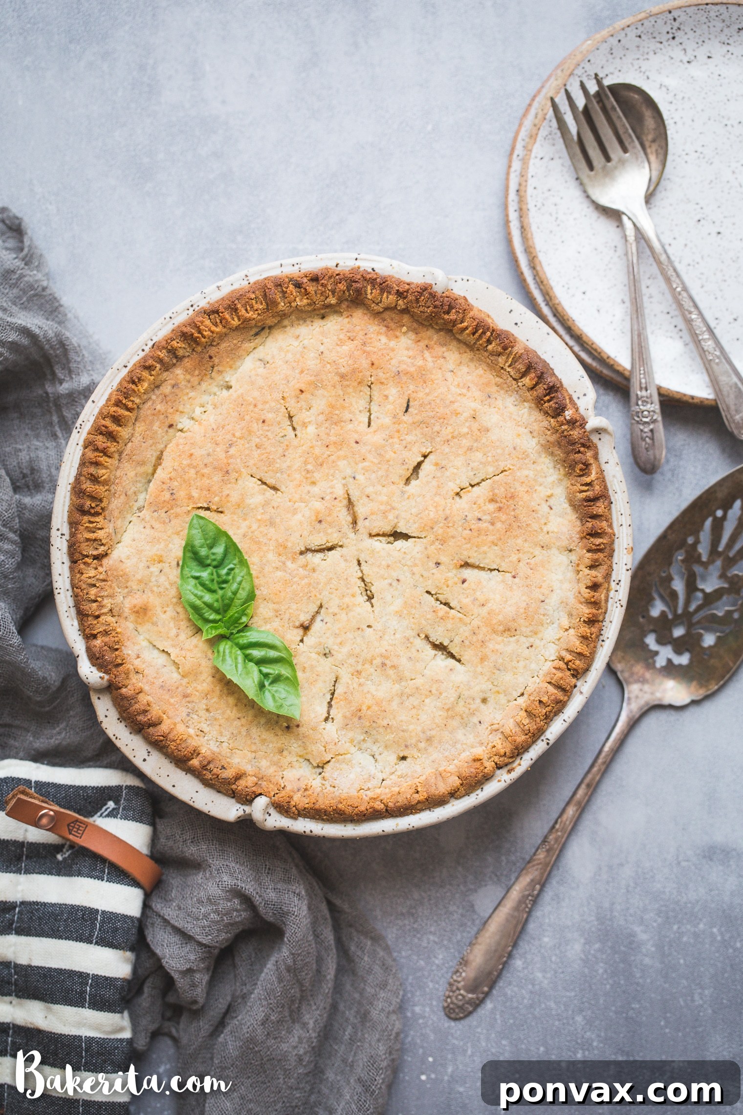 Close-up of a Vegan Pot Pie slice, revealing the thick, creamy vegetable filling and the tender, golden-brown gluten-free crust. A perfect healthy comfort food.