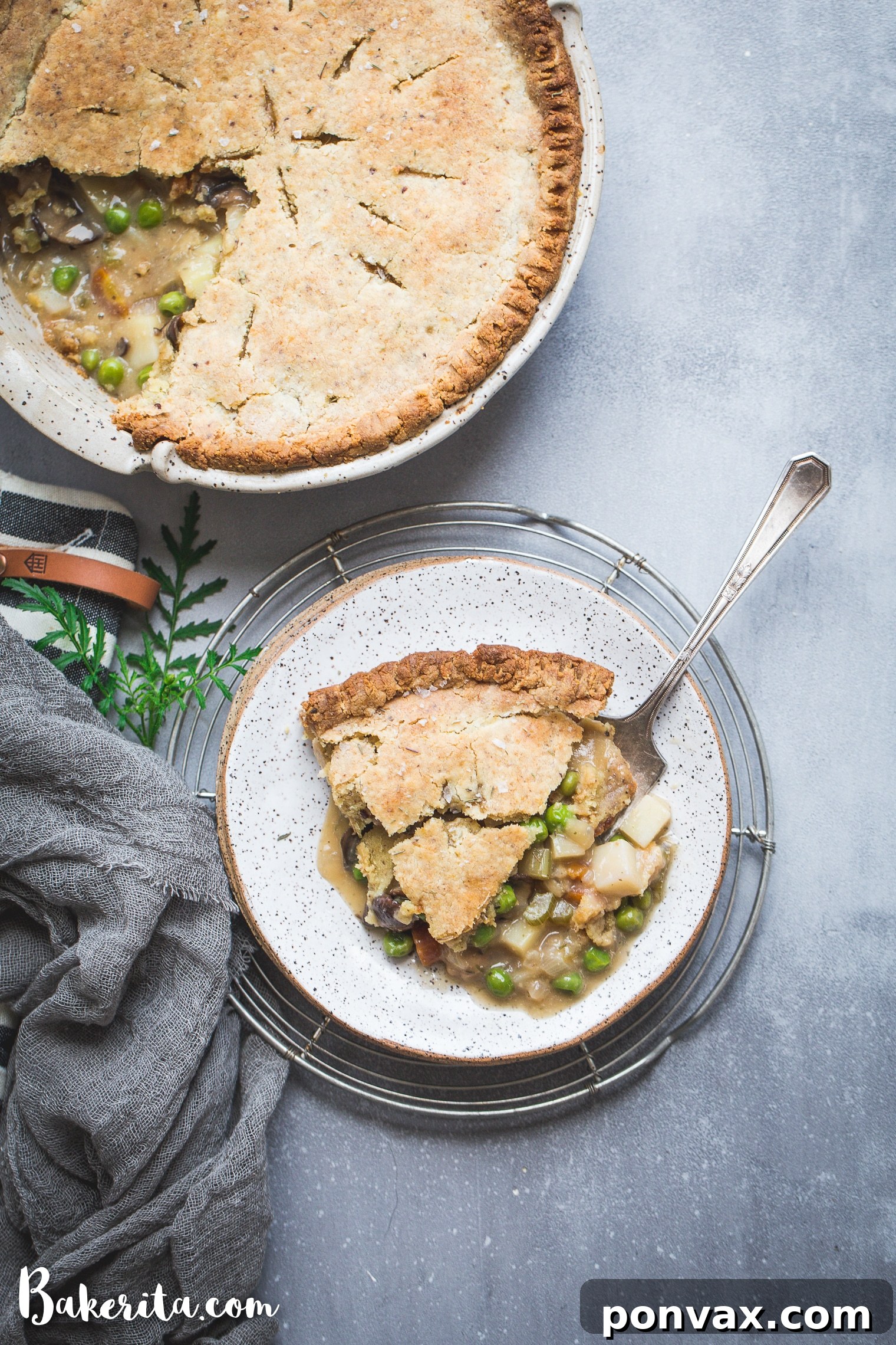 A whole Vegan Pot Pie, fresh from the oven, with a perfectly golden and crisp gluten-free crust. Emphasizes its hearty, freezer-friendly qualities.