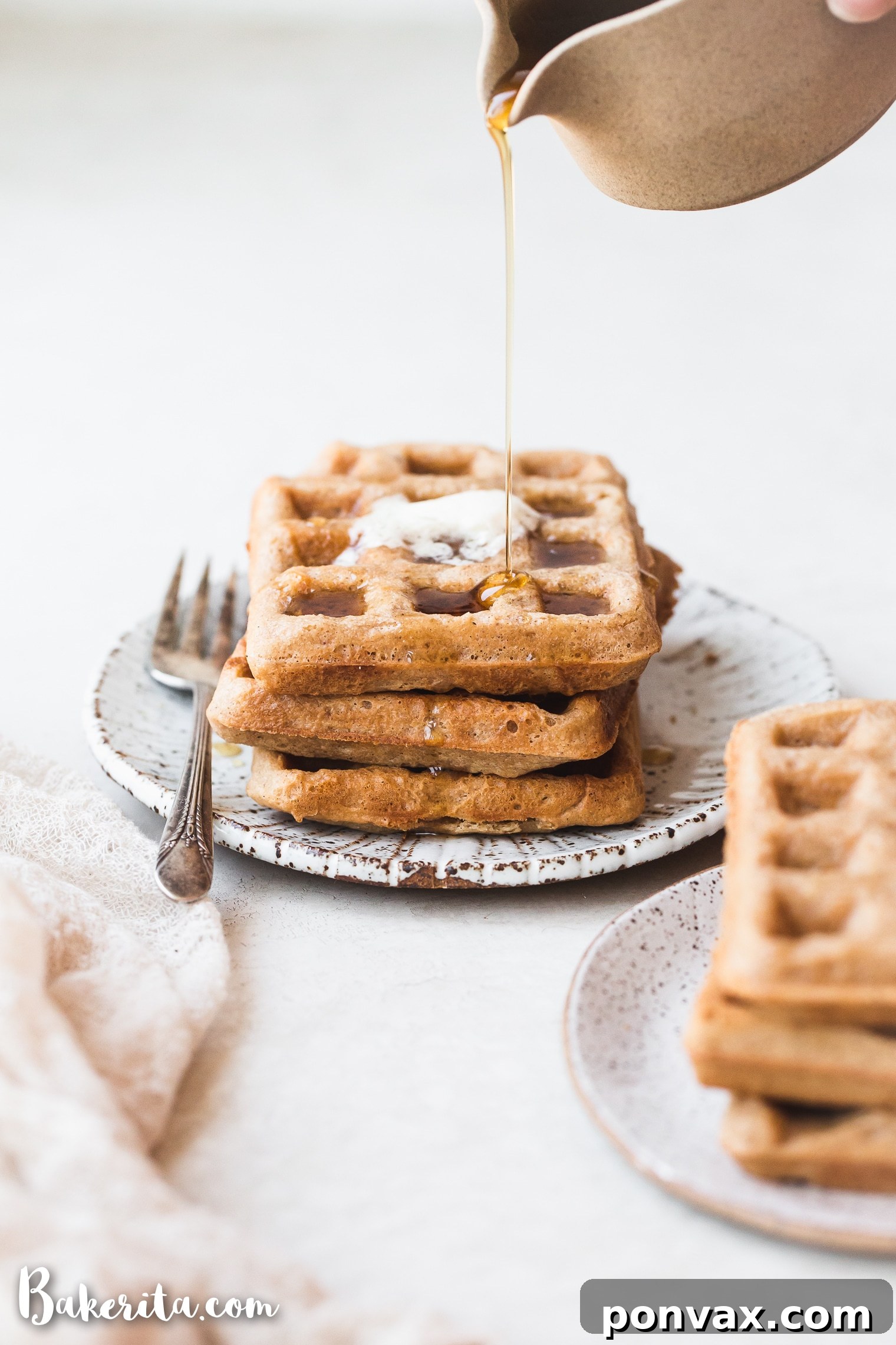 These Paleo Vegan Waffles are incredibly light, crispy, and best of all - easy to make! They're gluten-free, egg-free, and can easily be frozen for a quick breakfast.