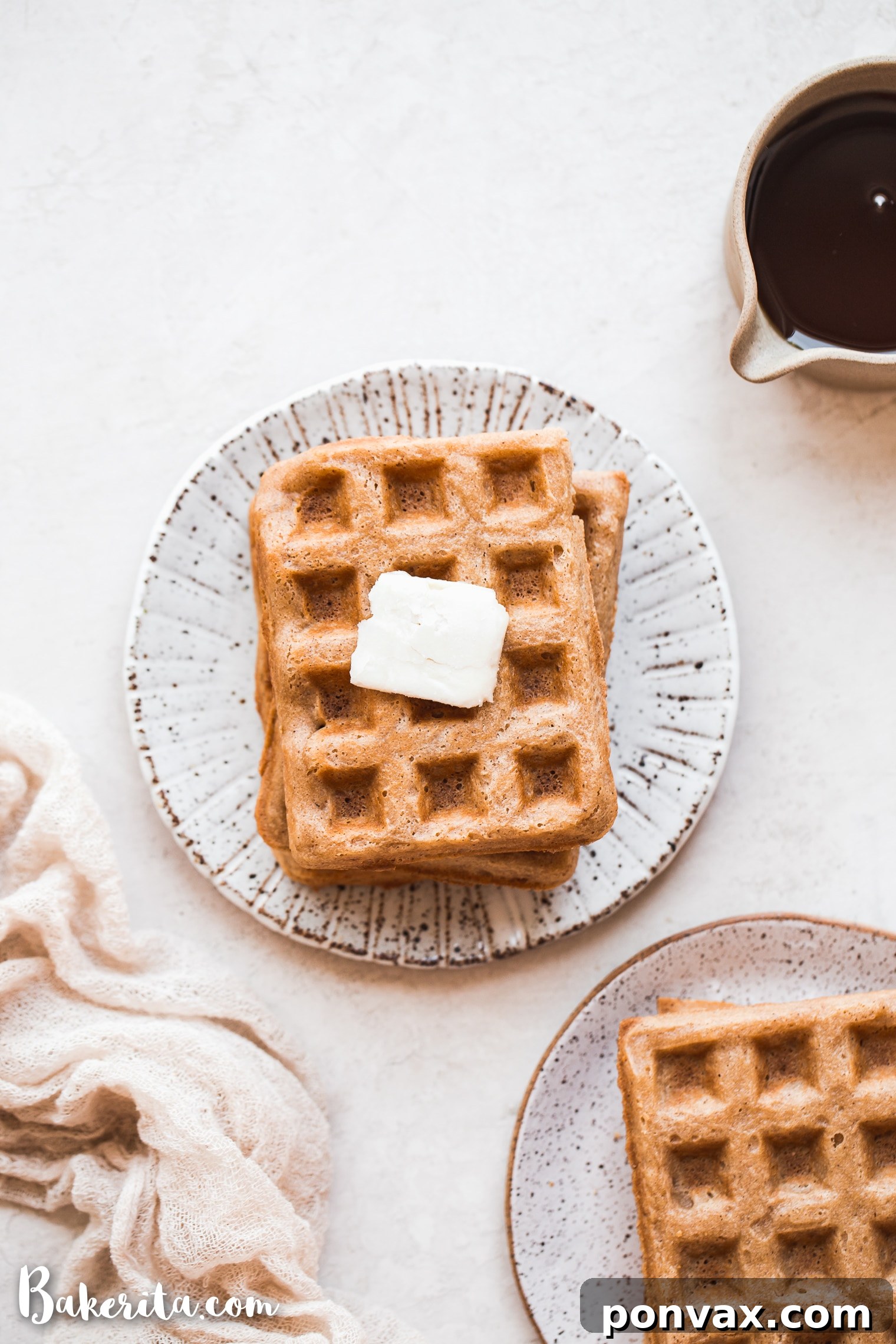 These Paleo Vegan Waffles are incredibly light, crispy, and best of all - easy to make! They're gluten-free, egg-free, and can easily be frozen for a quick breakfast.