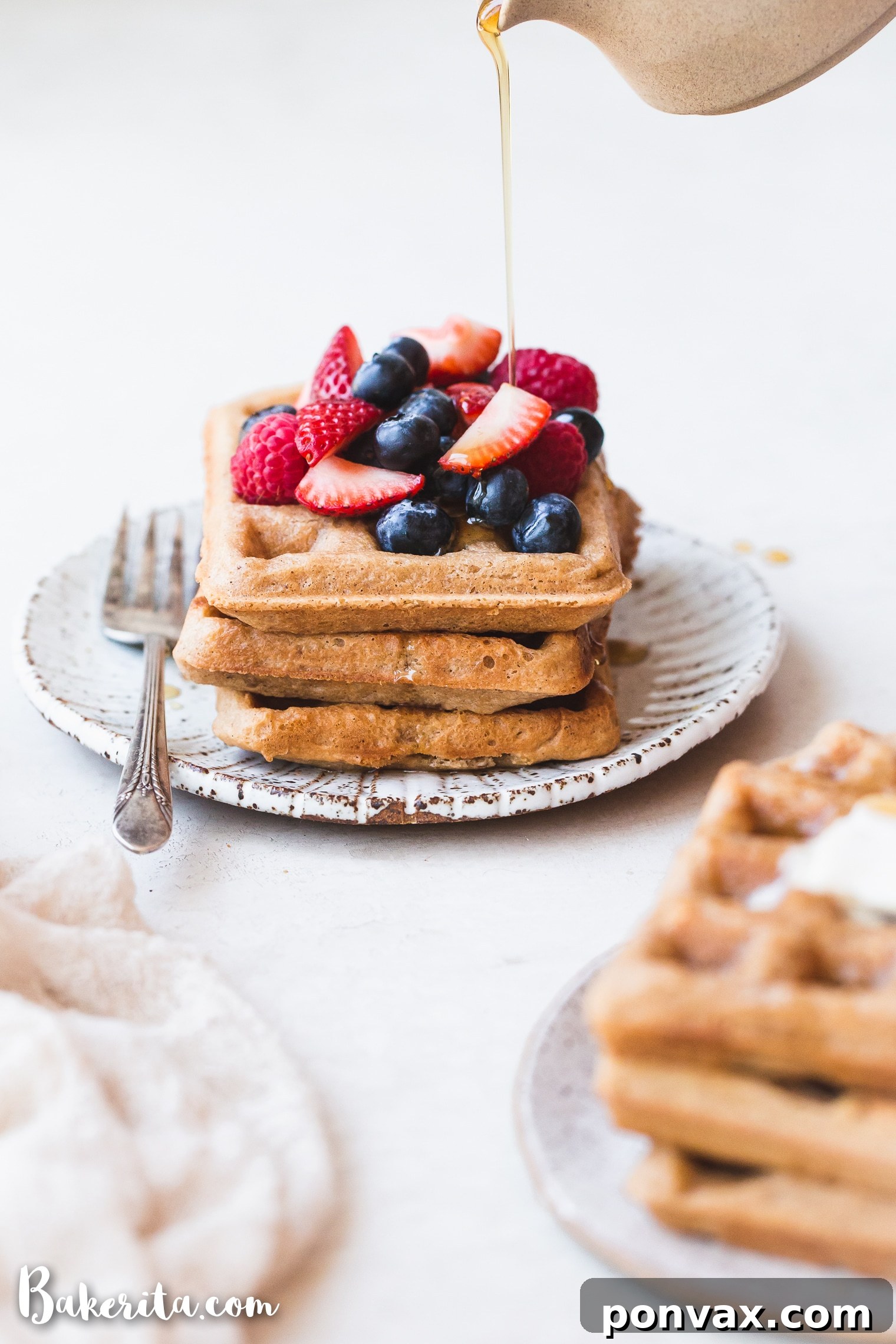 These Paleo Vegan Waffles are incredibly light, crispy, and best of all - easy to make! They're gluten-free, egg-free, and can easily be frozen for a quick breakfast.