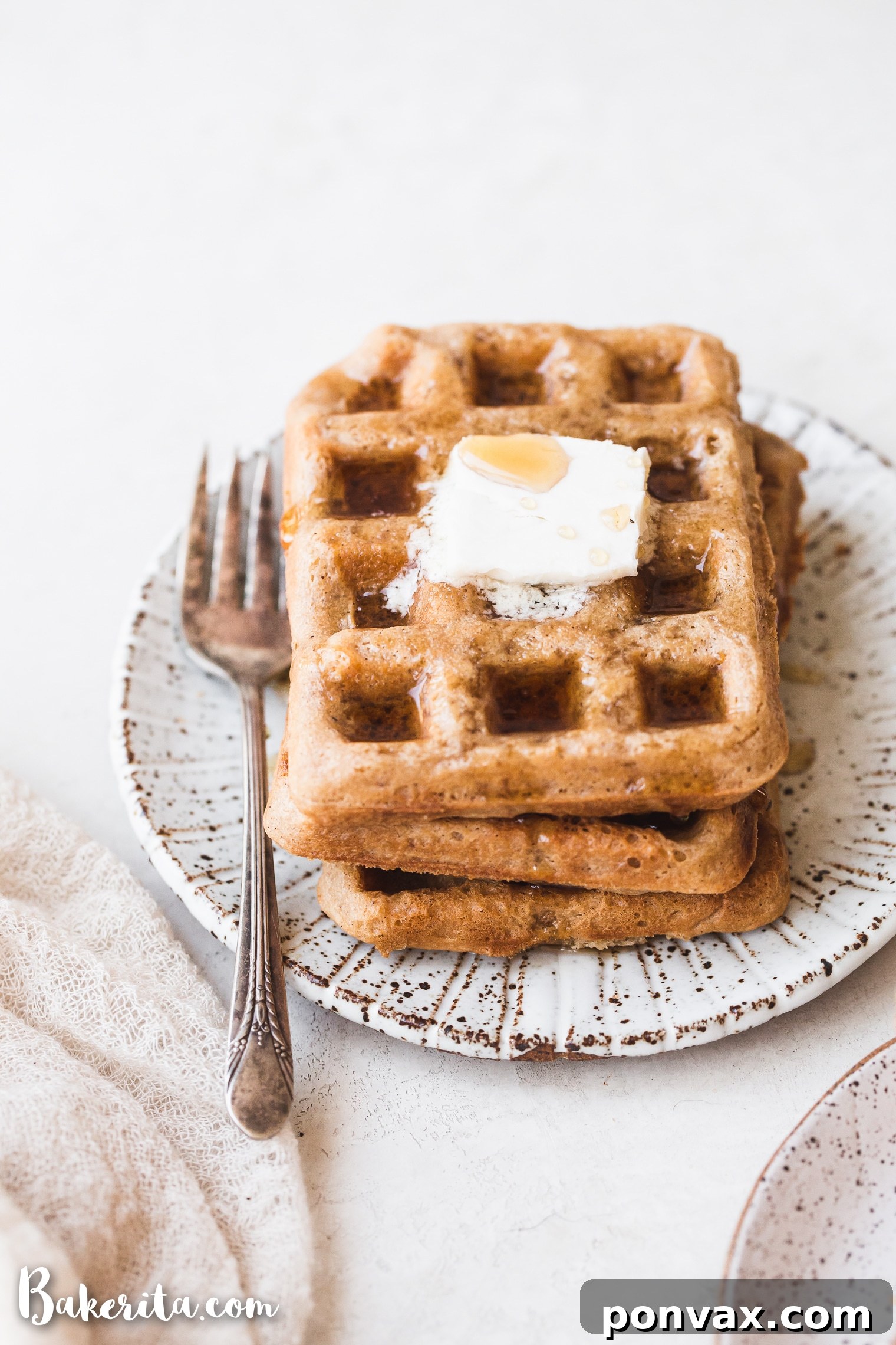 These Paleo Vegan Waffles are incredibly light, crispy, and best of all - easy to make! They're gluten-free, egg-free, and can easily be frozen for a quick breakfast.