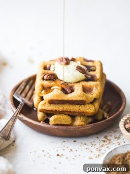 Gluten-Free Vegan Pumpkin Waffles (Freezer Friendly) - a full plate of delicious pumpkin waffles.
