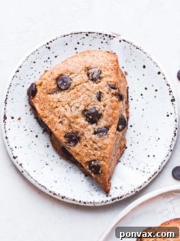 Tender and fluffy vegan gluten-free chocolate chip scones with a crispy exterior, perfect for breakfast, snack, or dessert.