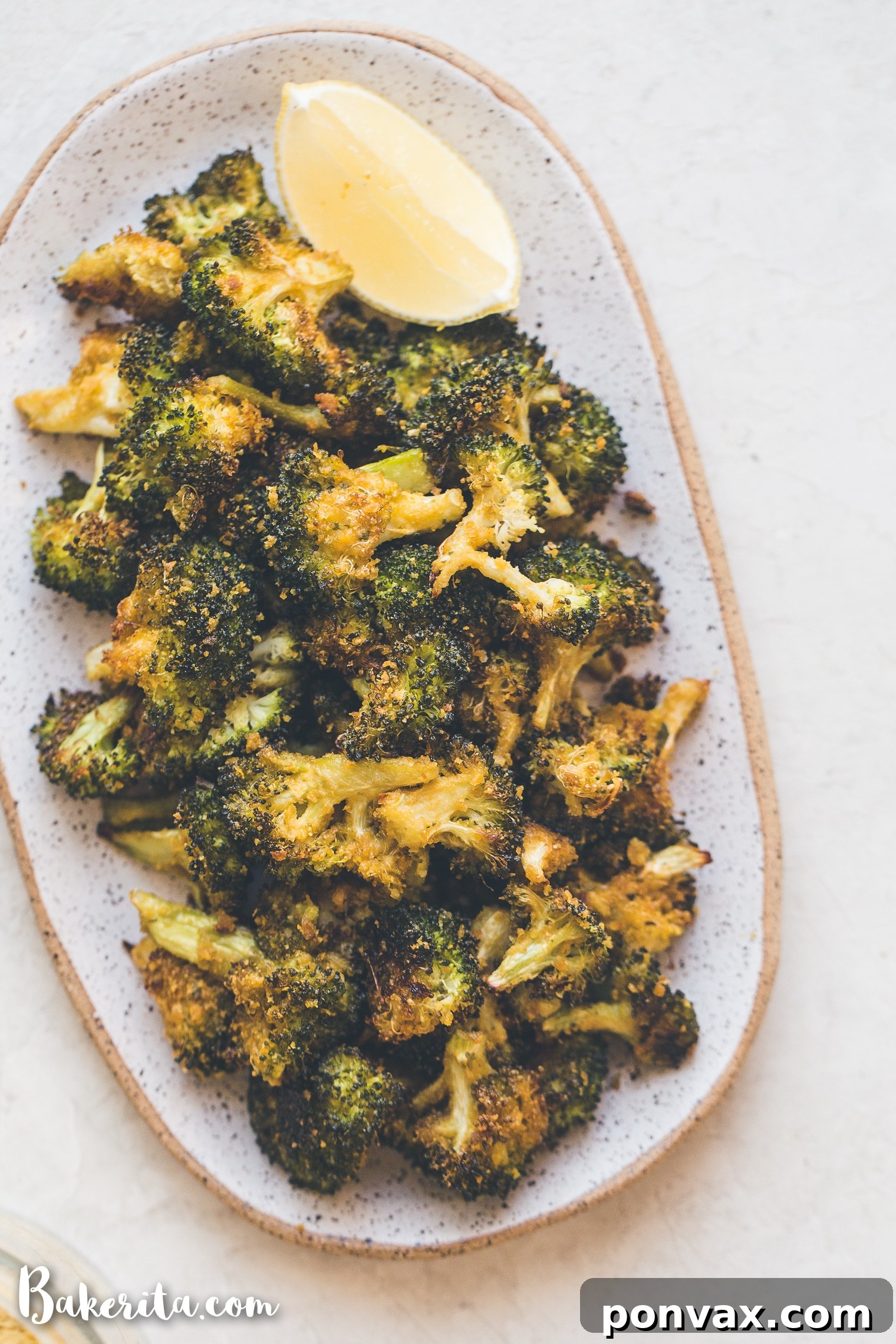 Deliciously crispy roasted broccoli florets, perfectly seasoned and ready to enjoy as a healthy side dish.