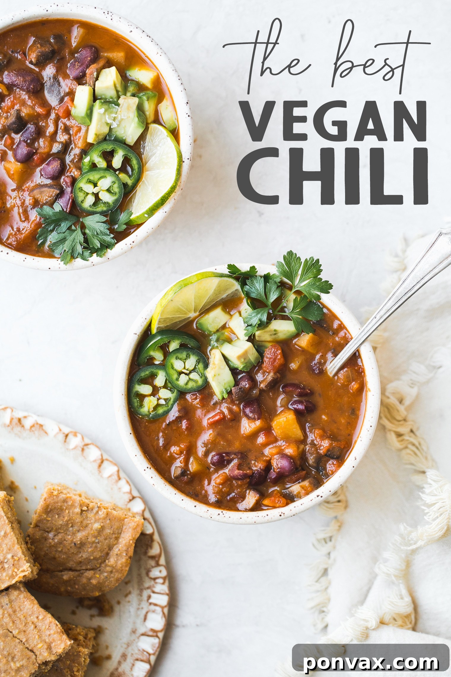 A large pot filled with freshly cooked vegan chili, steam rising from the surface.
