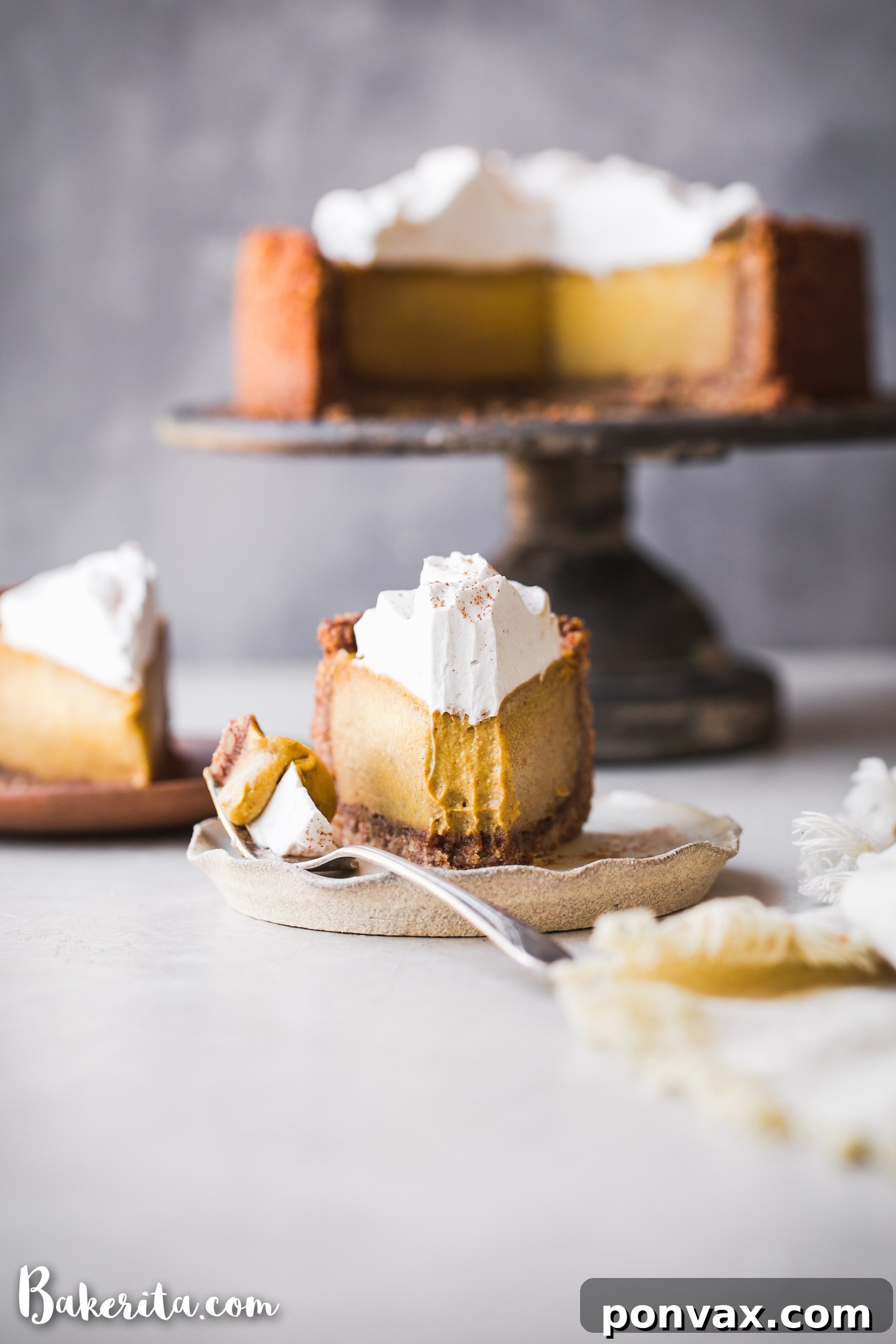 Autumn Glow Vegan Gluten-Free Pumpkin Cheesecake 7 A close-up of a full Baked Vegan Pumpkin Cheesecake, garnished simply, highlighting its smooth, autumnal surface.