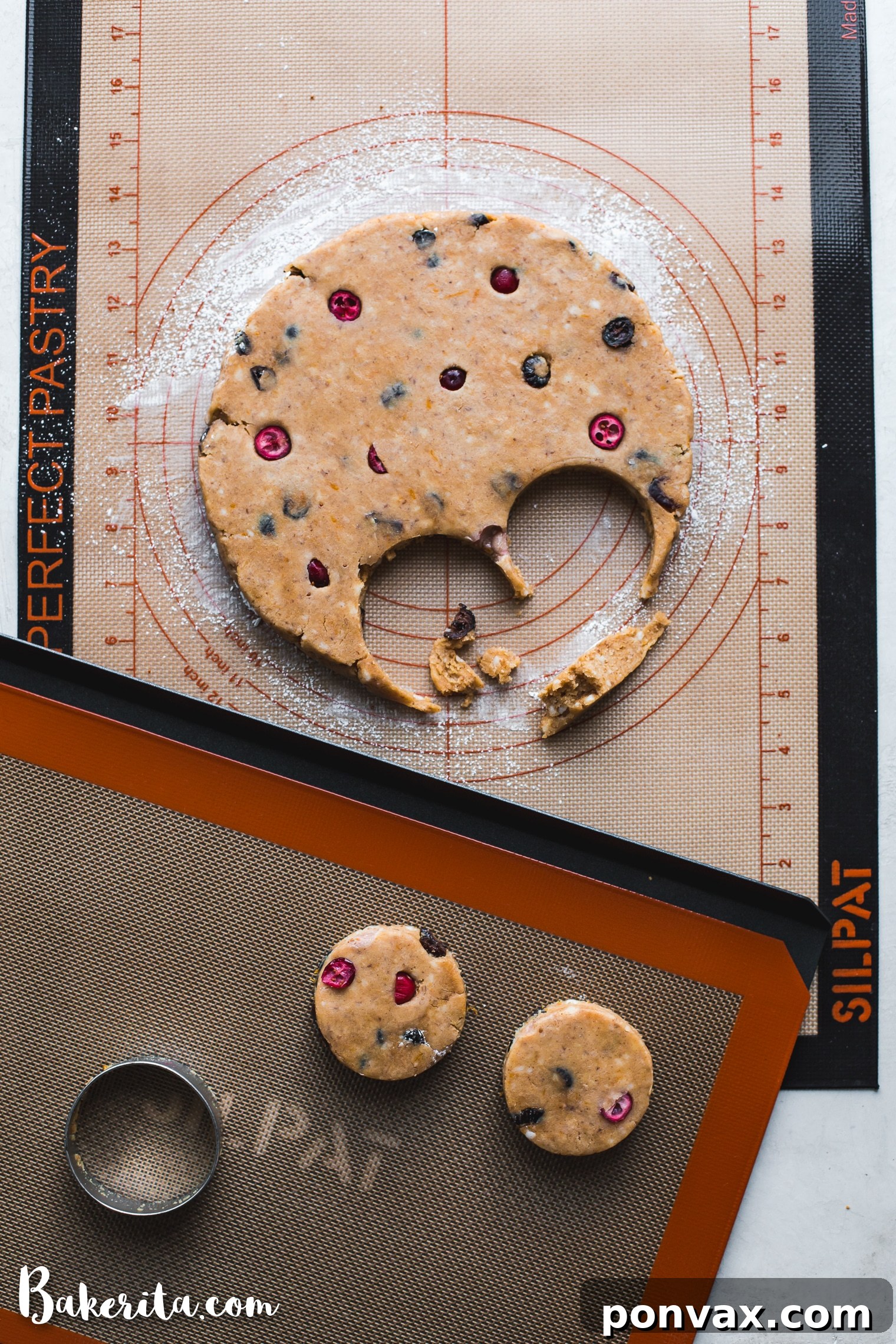 Scone dough being rolled out on a Silpat Perfect Pastry Mat, displaying the guides for even thickness.