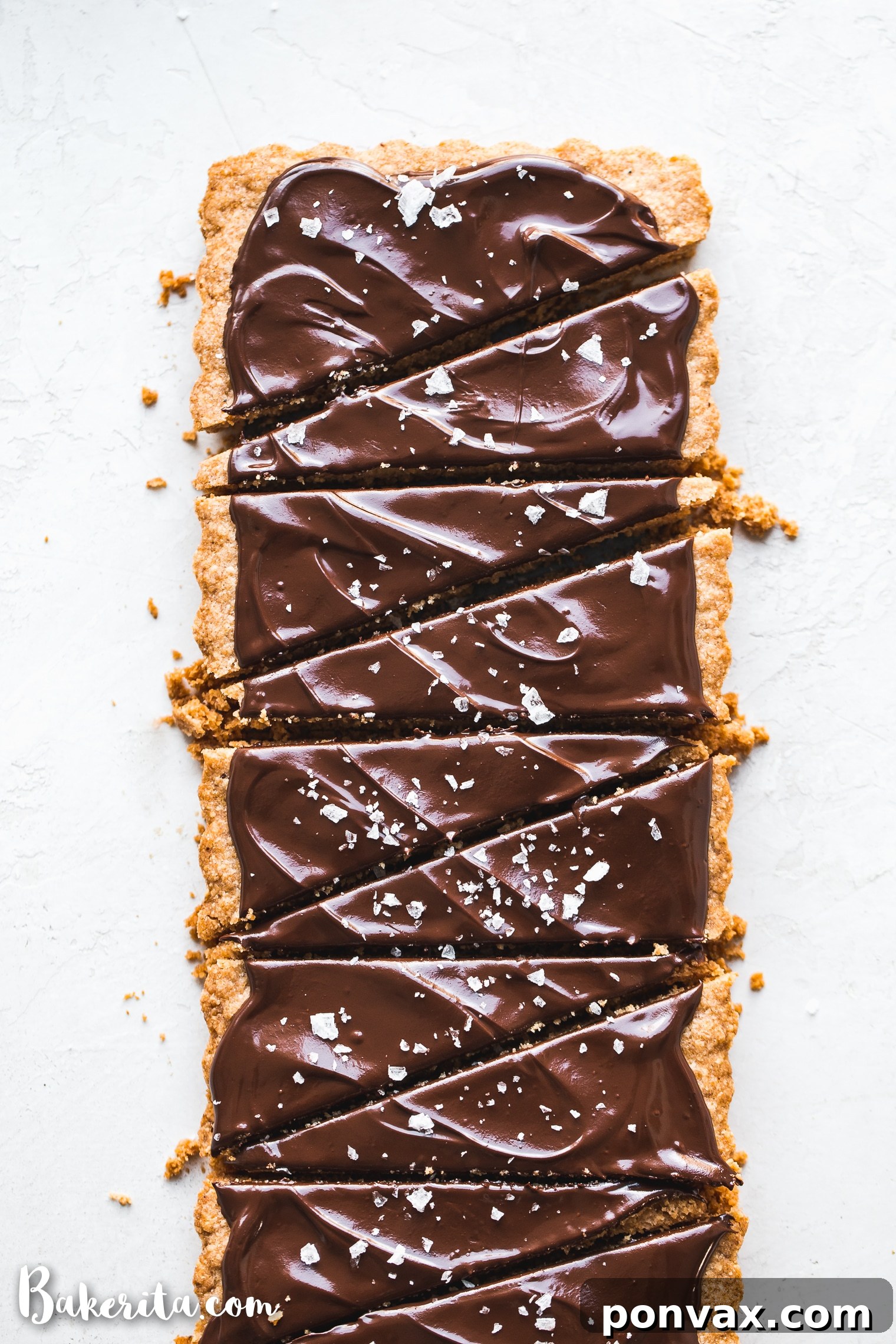 Rich and buttery gluten-free vegan shortbread cookies, perfect for holidays, on a light background.