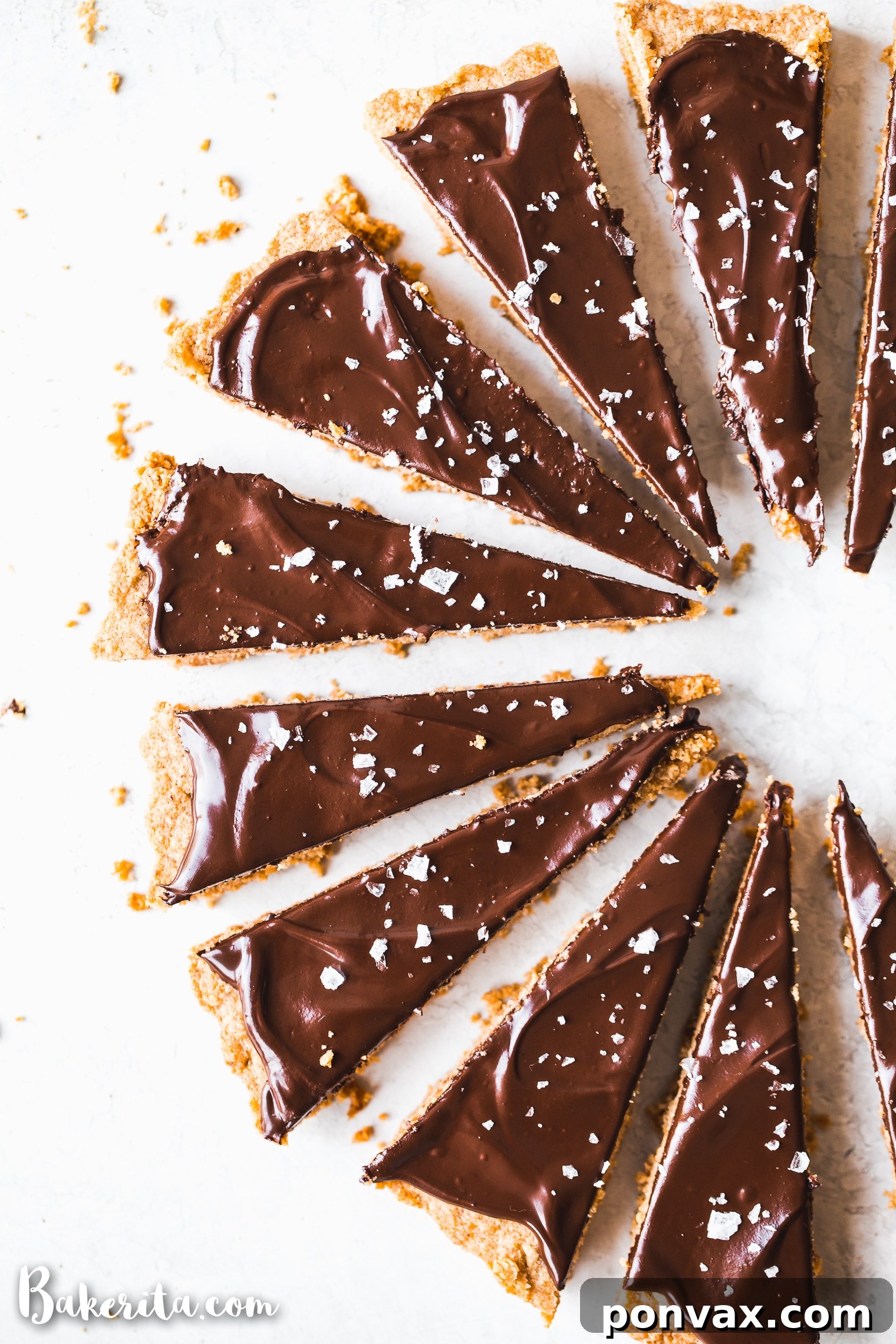 Close-up of golden-brown gluten-free vegan shortbread cookies on a cooling rack, highlighting their perfect texture.
