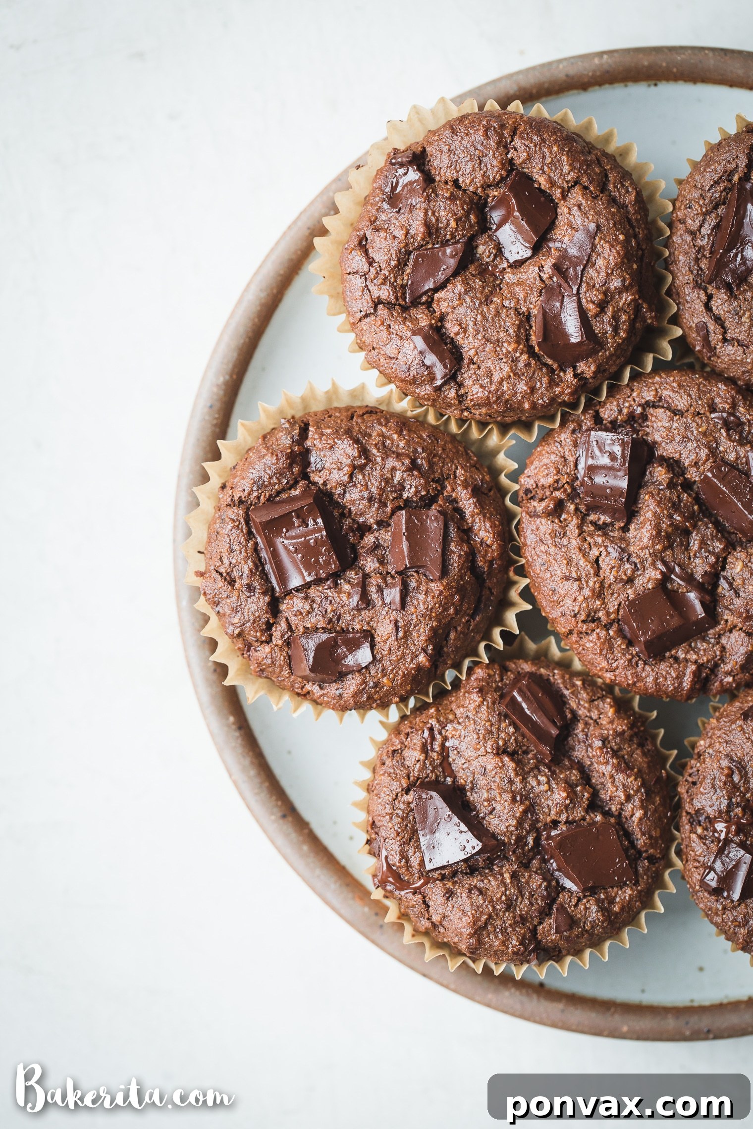 Decadent Gluten-Free Vegan Double Chocolate Muffins 3 These Gluten-Free Vegan Double Chocolate Muffins are easy to make in one bowl, offering a delicious and healthy breakfast option.