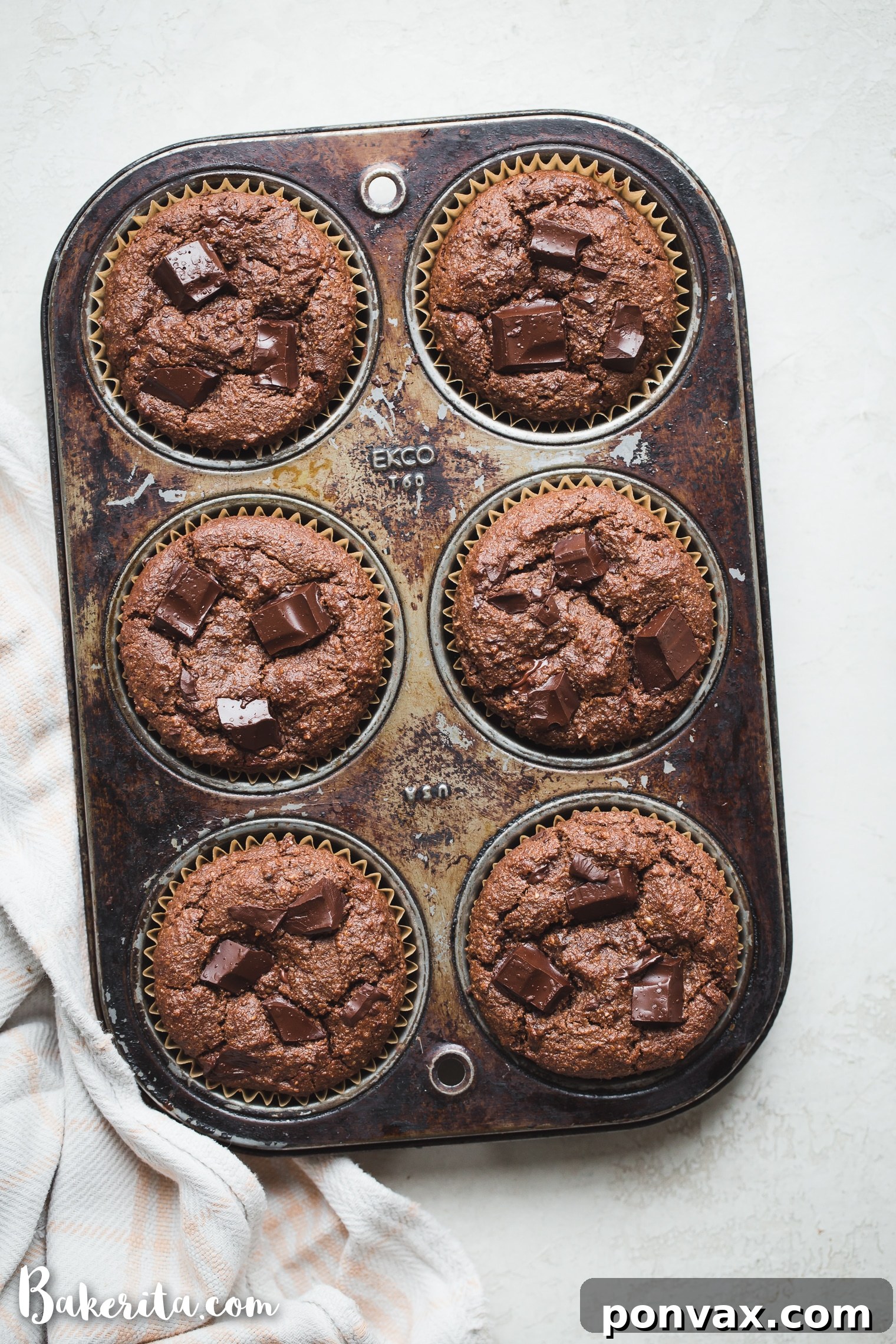 Decadent Gluten-Free Vegan Double Chocolate Muffins 4 Wet ingredients for Gluten-Free Vegan Double Chocolate Muffins, including applesauce, almond milk, and coconut oil.