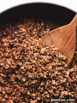 A bowl of freshly made vegan taco meat, showcasing its rich texture and savory appeal, ready to be incorporated into various delicious dishes.