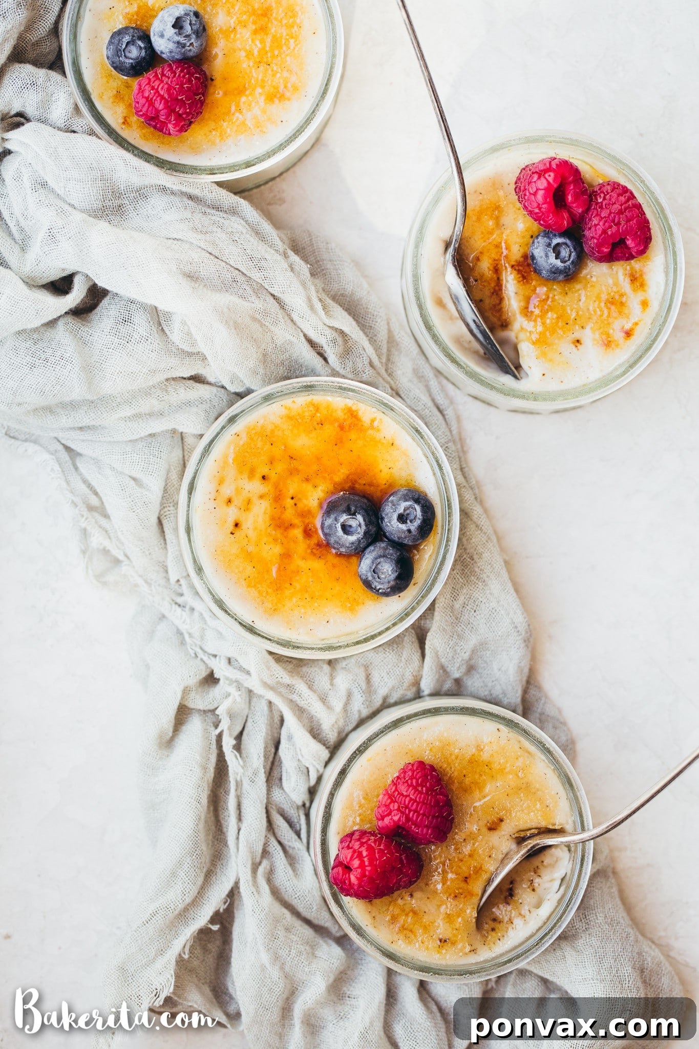 A kitchen torch caramelizing the sugar on top of a Vegan Creme Brulee, creating a golden-brown crust.