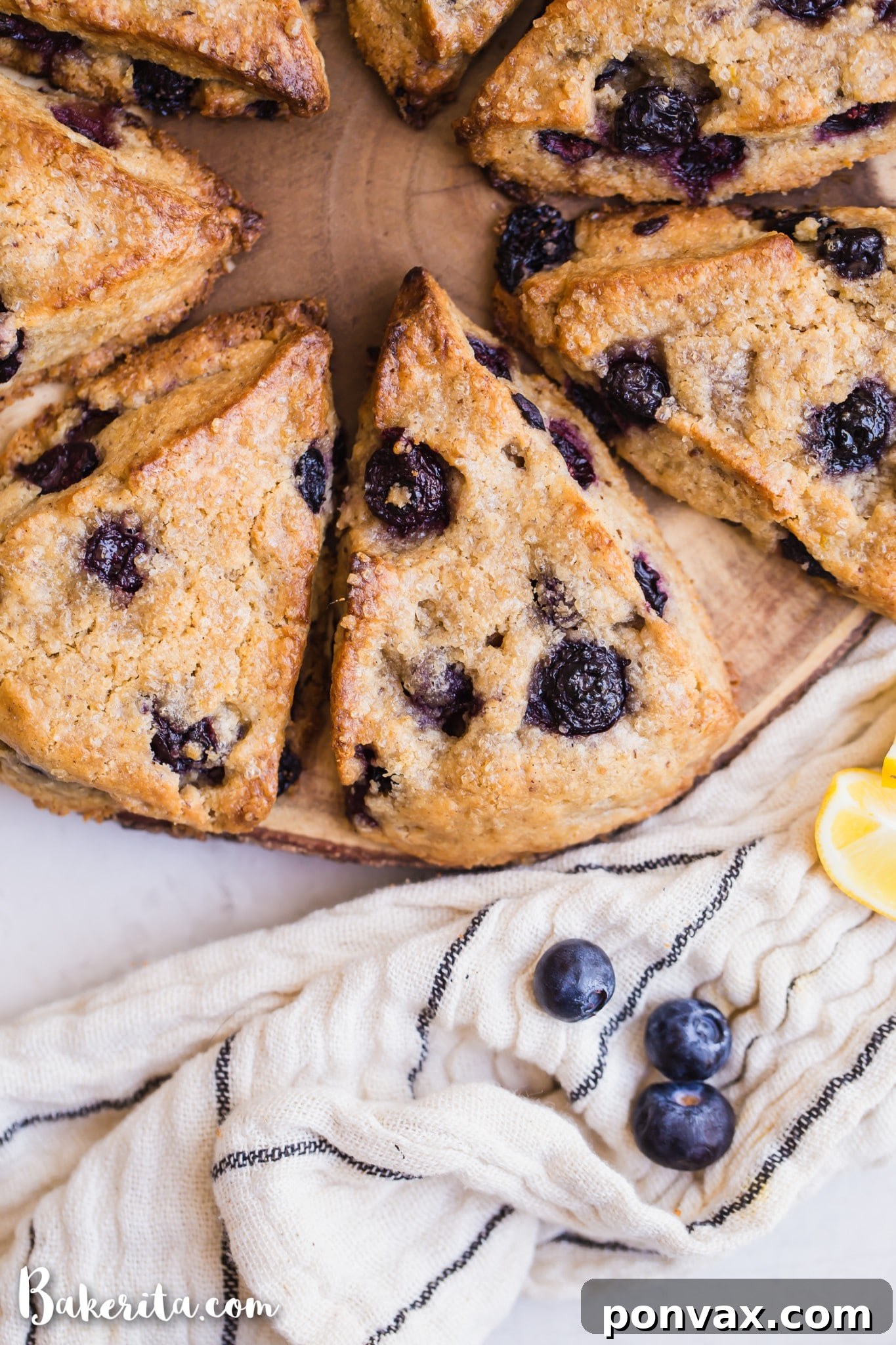 A close-up of the scone dough before baking, showing the vibrant blueberries and lemon zest mixed in, ready for chilling.