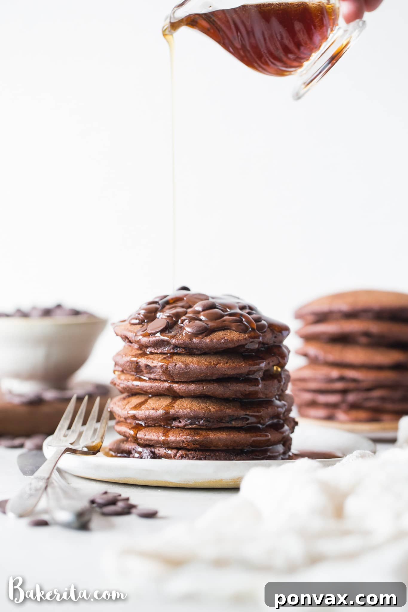 Decadent Plant-Based Gluten-Free Double Chocolate Pancakes 4 These Gluten-Free Vegan Double Chocolate Pancakes are a deliciously fluffy and decadent breakfast! Made with rolled oats and loaded with chocolate chips.