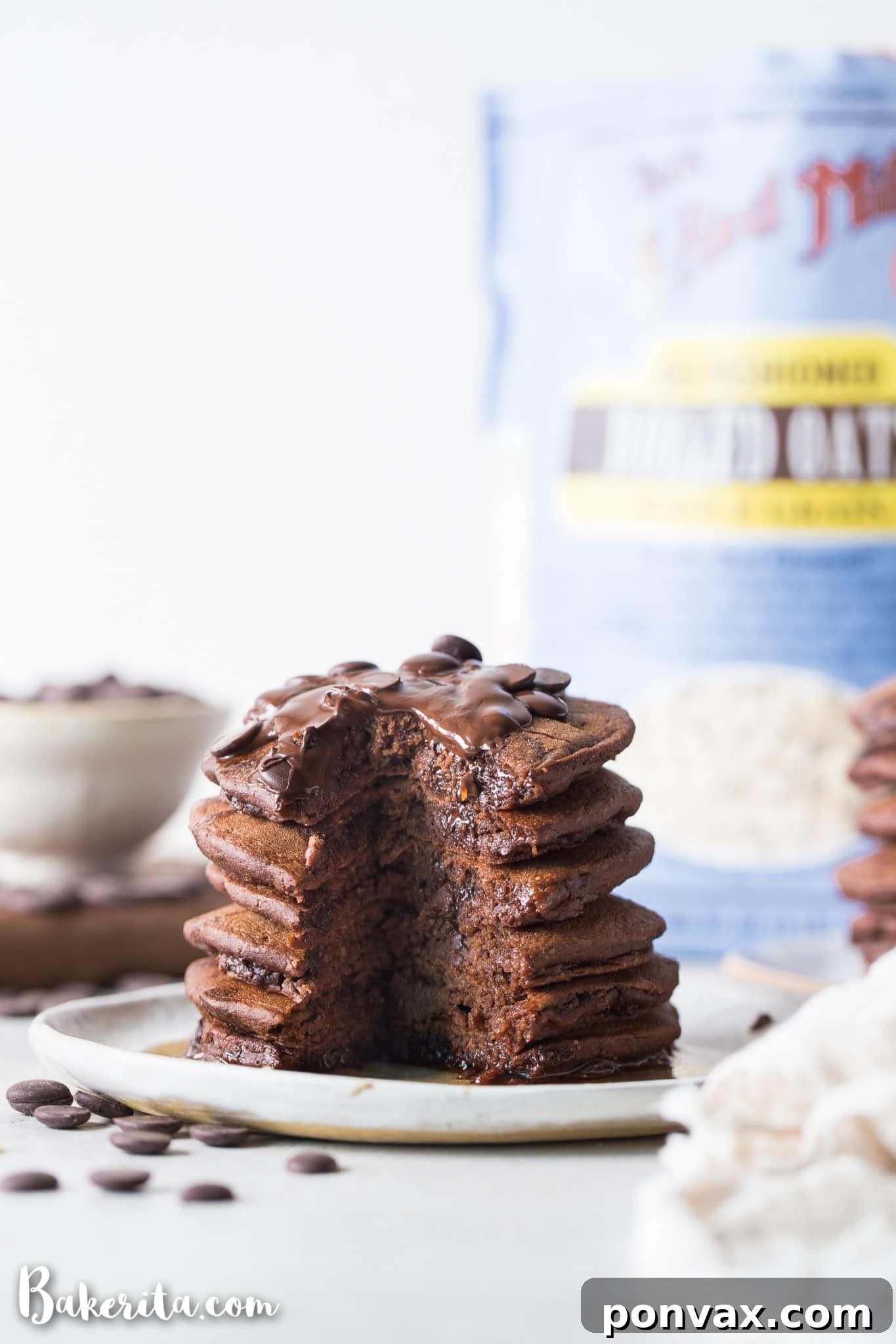 Decadent Plant-Based Gluten-Free Double Chocolate Pancakes 5 These Gluten-Free Vegan Double Chocolate Pancakes are a deliciously fluffy and decadent breakfast! Made with rolled oats and loaded with chocolate chips.