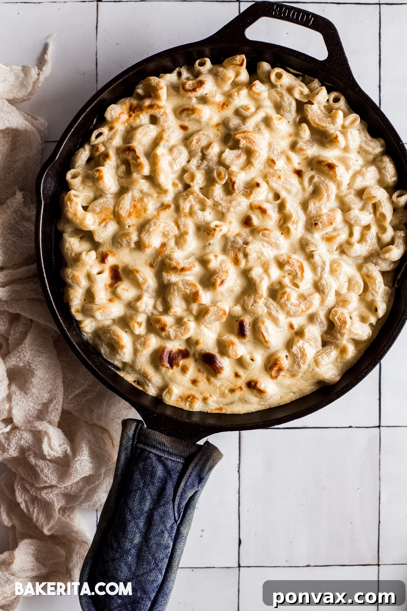 Another enticing angle of the vegan mac and cheese, showcasing its golden hue and the inviting texture of the sauce and pasta.