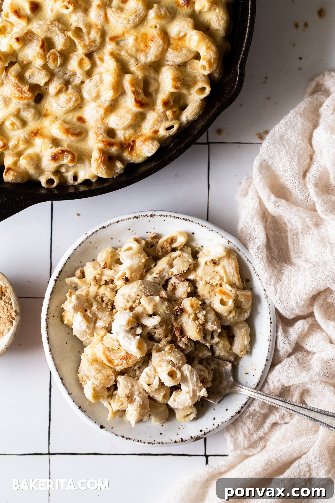 A vibrant close-up of the vegan mac and cheese, highlighting the individual noodles coated in a rich, velvety sauce. A truly mouth-watering image.