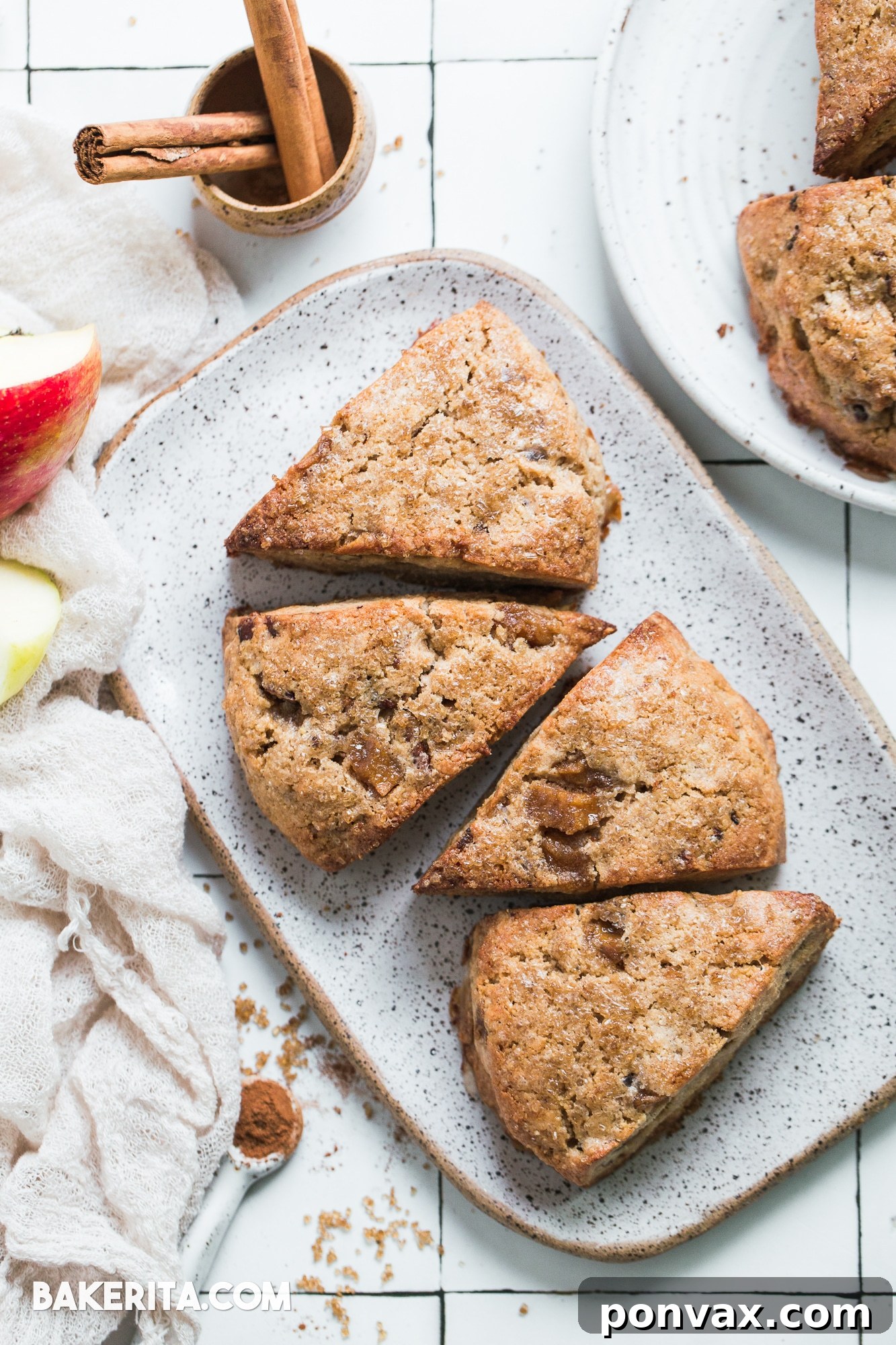 Diced Honeycrisp apple cooking in a pan with coconut sugar, beginning to caramelize for the scone filling.
