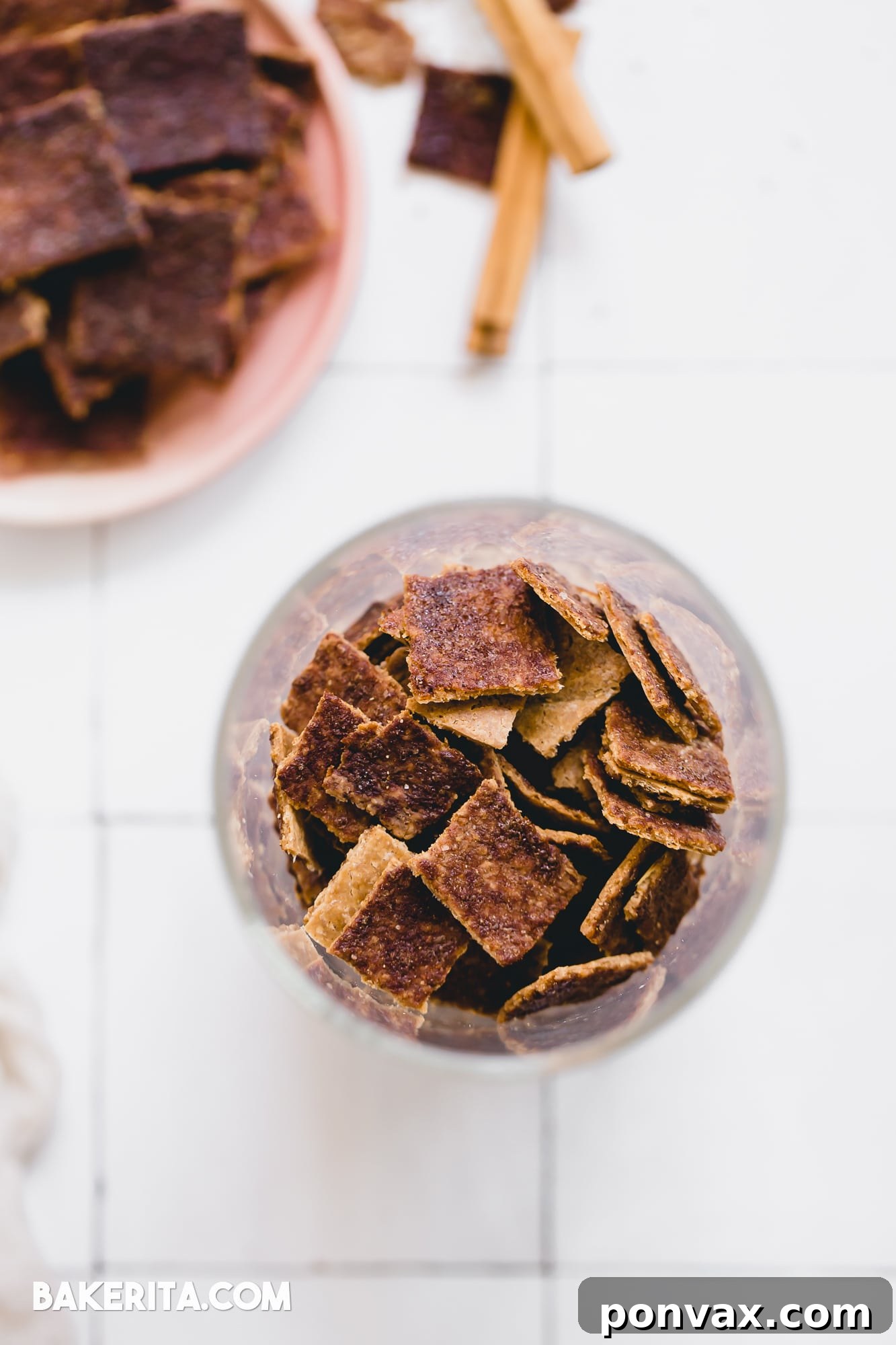 Spiced Gluten-Free Sourdough Discard Crisps 5 A small bowl of Gluten-Free Cinnamon Sugar Sourdough Discard Crackers with a blurred background