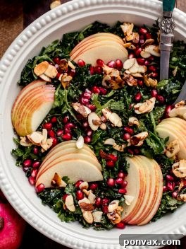 The finished Autumn Kale Harvest Salad, a beautiful and appetizing dish perfect for fall and holiday meals.