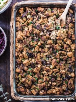A delicious Gluten-Free Vegan Mushroom Stuffing in a casserole dish.