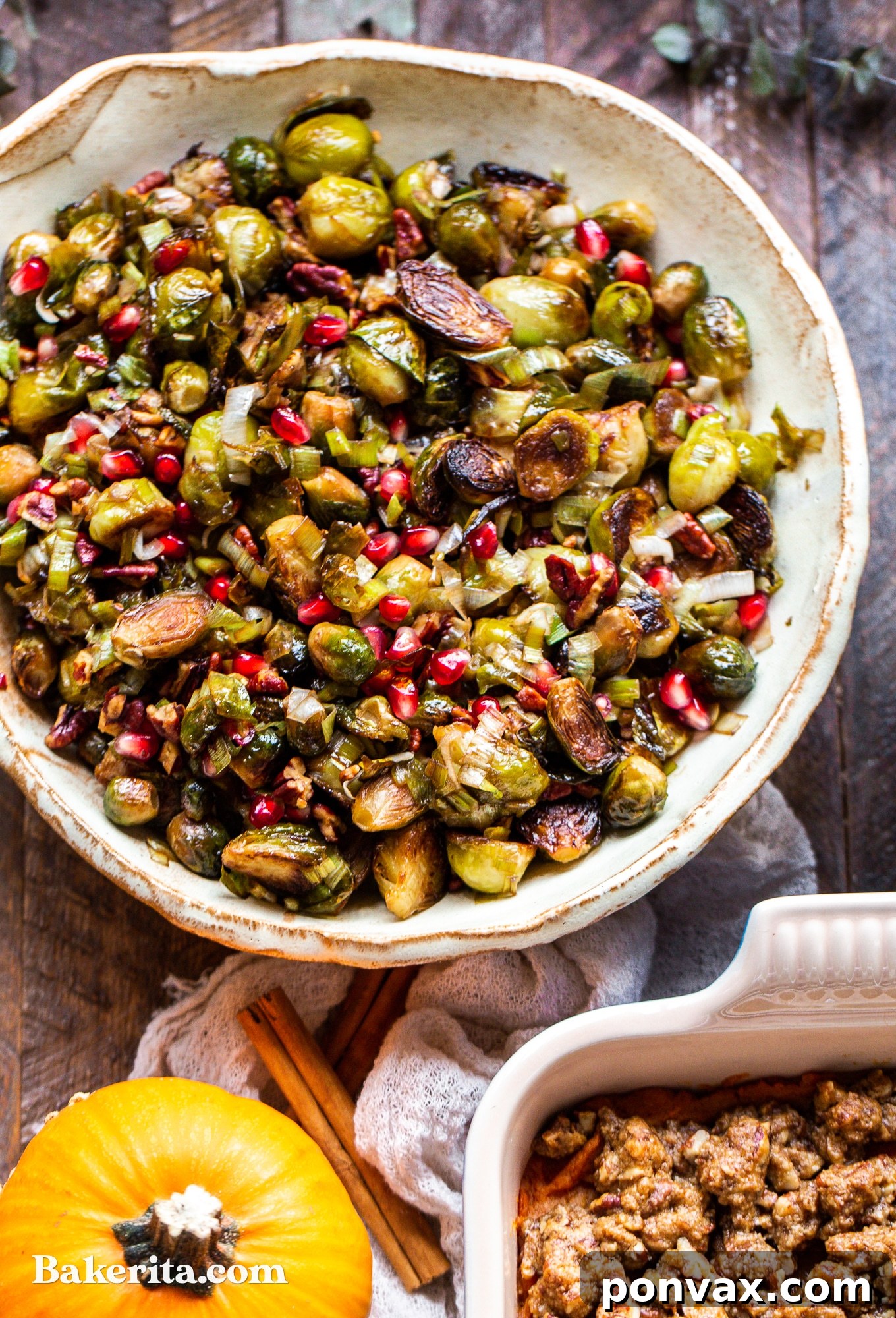 Jewel-Toned Roasted Brussels Sprouts with Pomegranate and Pecans 5 A vibrant side dish of roasted Brussels sprouts with pomegranate and pecans, ready to be served.