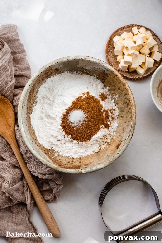 Ingredients for gluten-free vegan pie crust laid out, including almond flour, tapioca flour, and Flora Plant Butter.