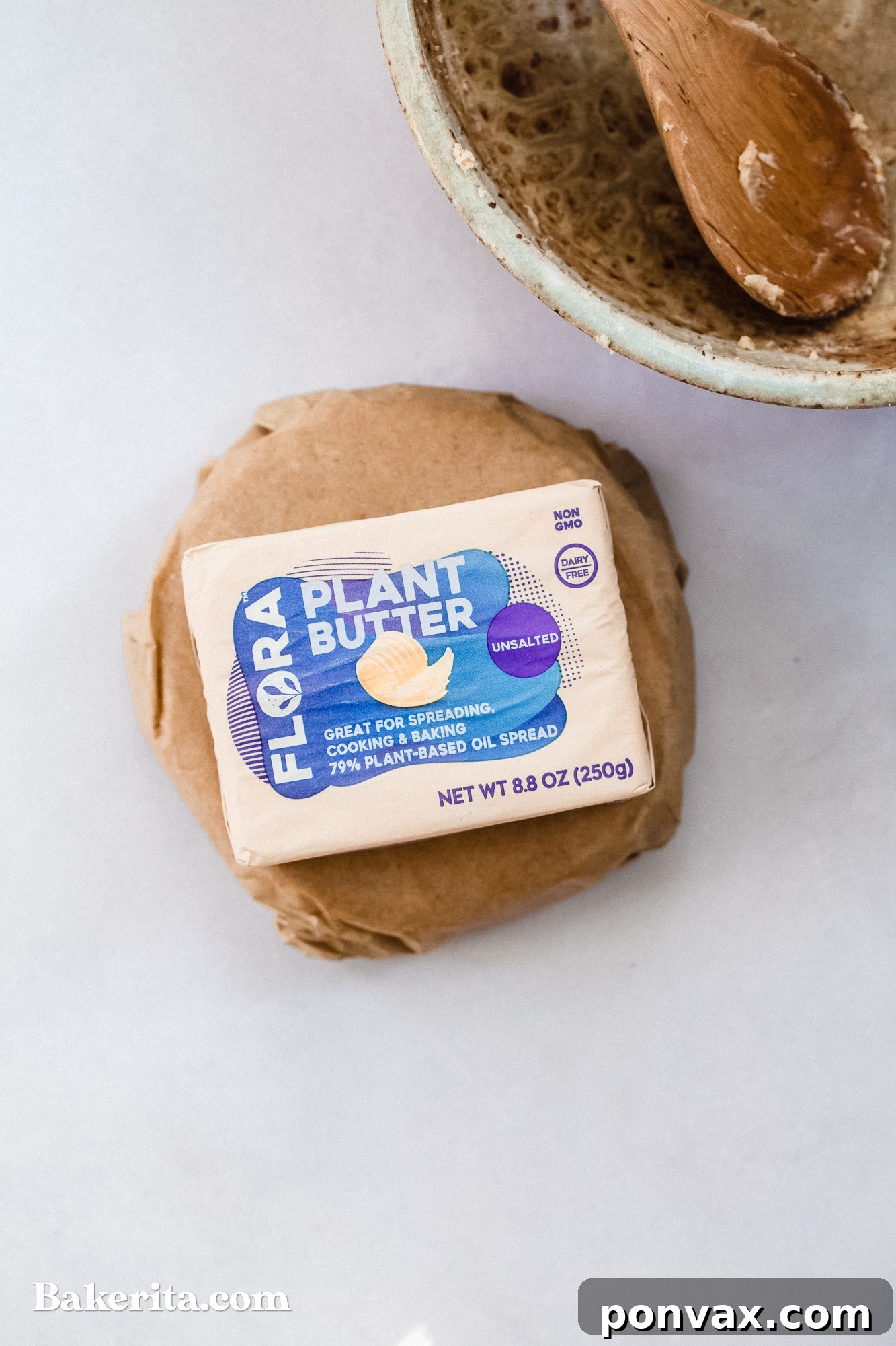 A beautifully formed gluten-free vegan pie crust in a pie dish, ready for filling.