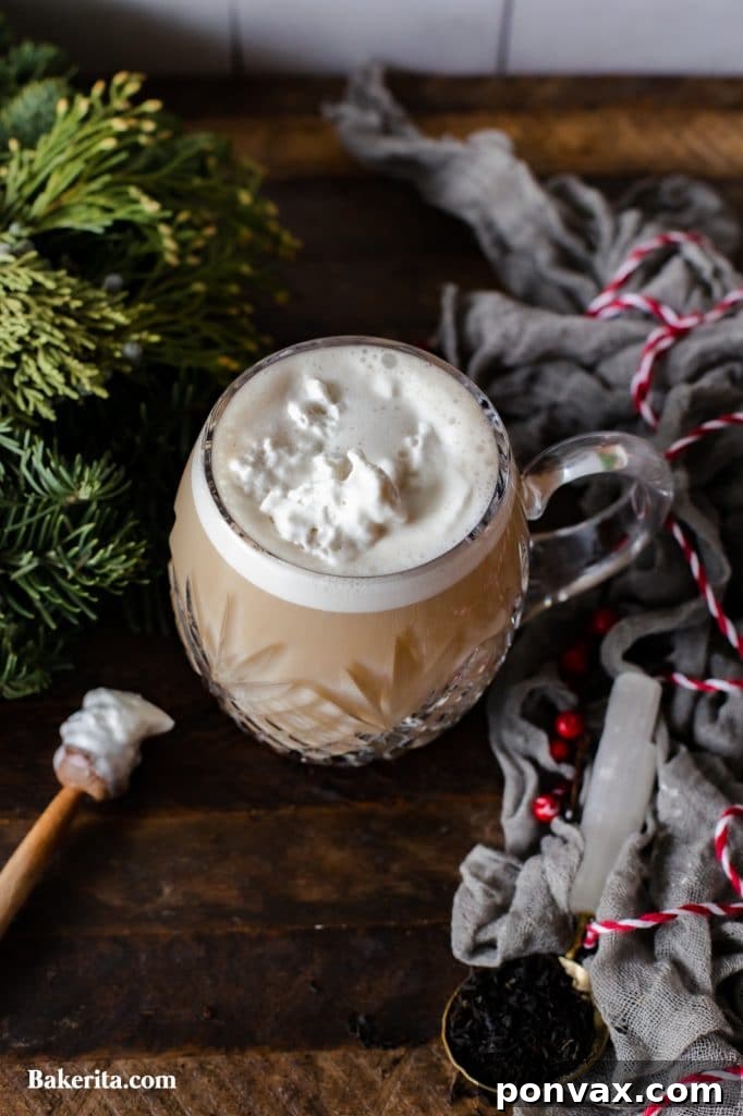 Seasonal Sips: Peppermint Mocha, London Fog, and Salted Cashew Hot Chocolate 8 Pouring frothed milk into brewed Earl Grey tea for a London Fog.