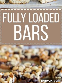 Irresistible Fully Loaded Bars with oat shortbread, peanut butter caramel, pretzels, chocolate, and peanuts.