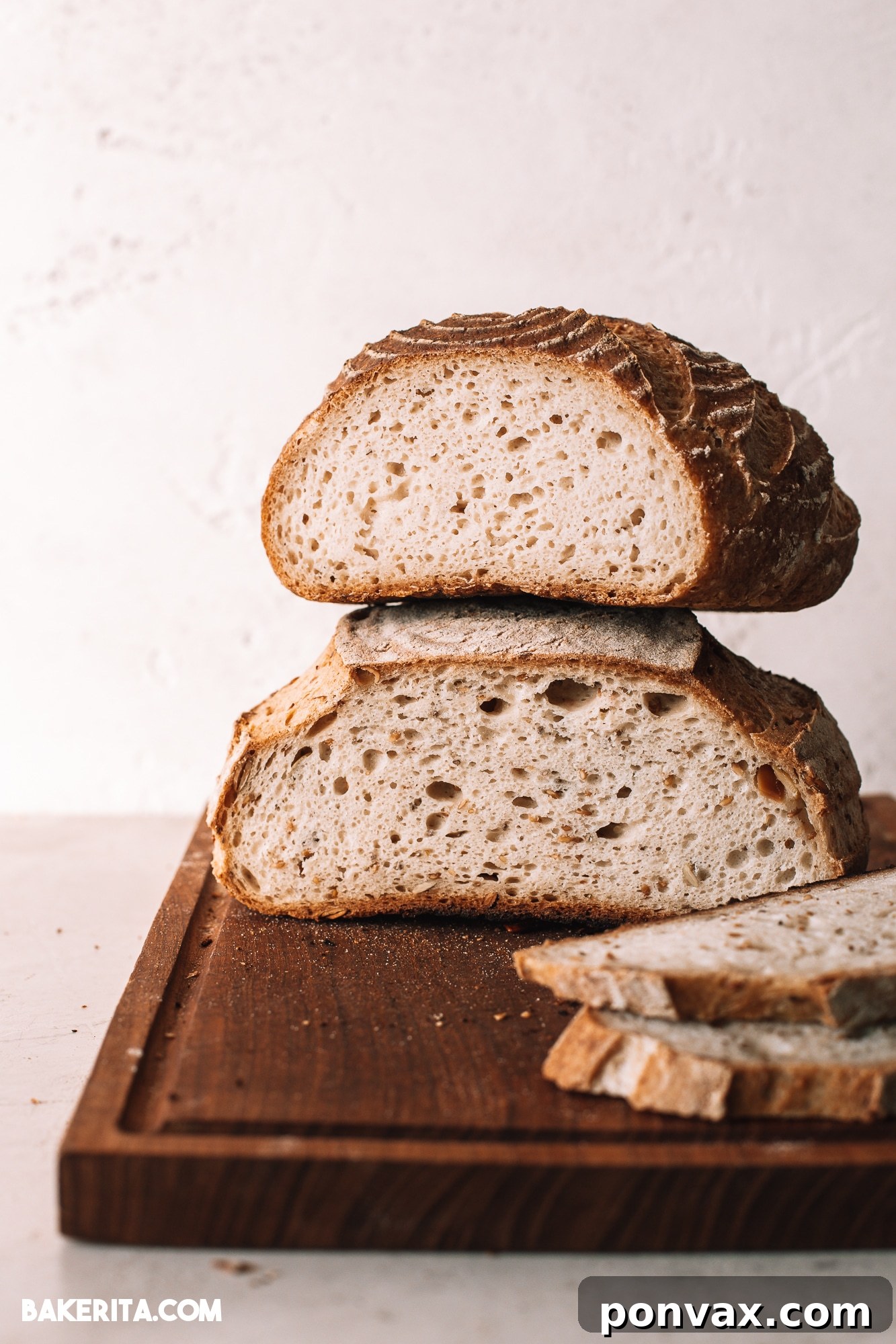 Crafting Perfect Gluten-Free Sourdough 2 Perfectly baked gluten-free sourdough bread with a crispy crust, ready to be sliced, a true testament to successful gluten-free baking.