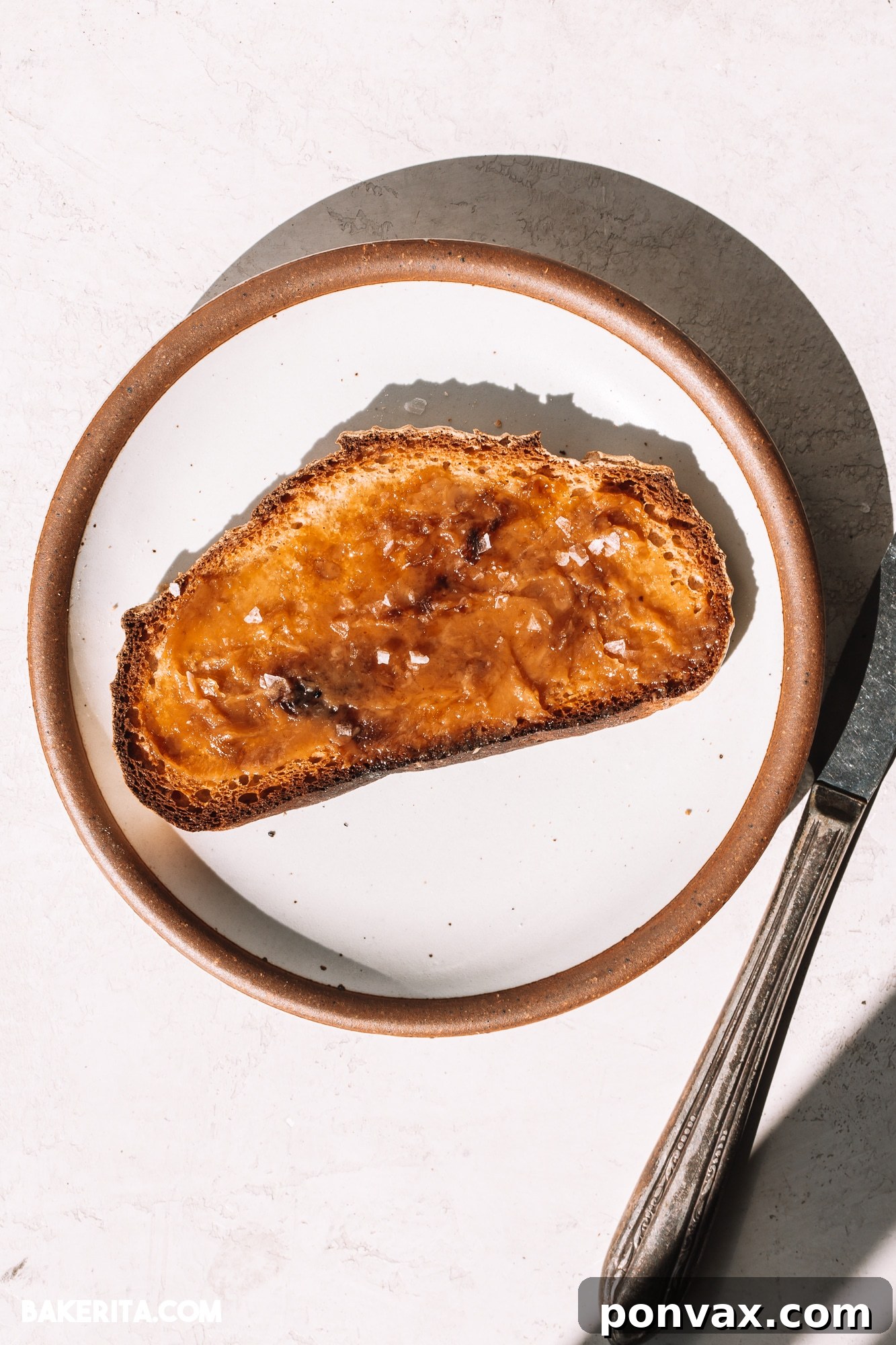 Crafting Perfect Gluten-Free Sourdough 8 A selection of essential baking tools for sourdough, including a banneton, lame, and dough scraper.