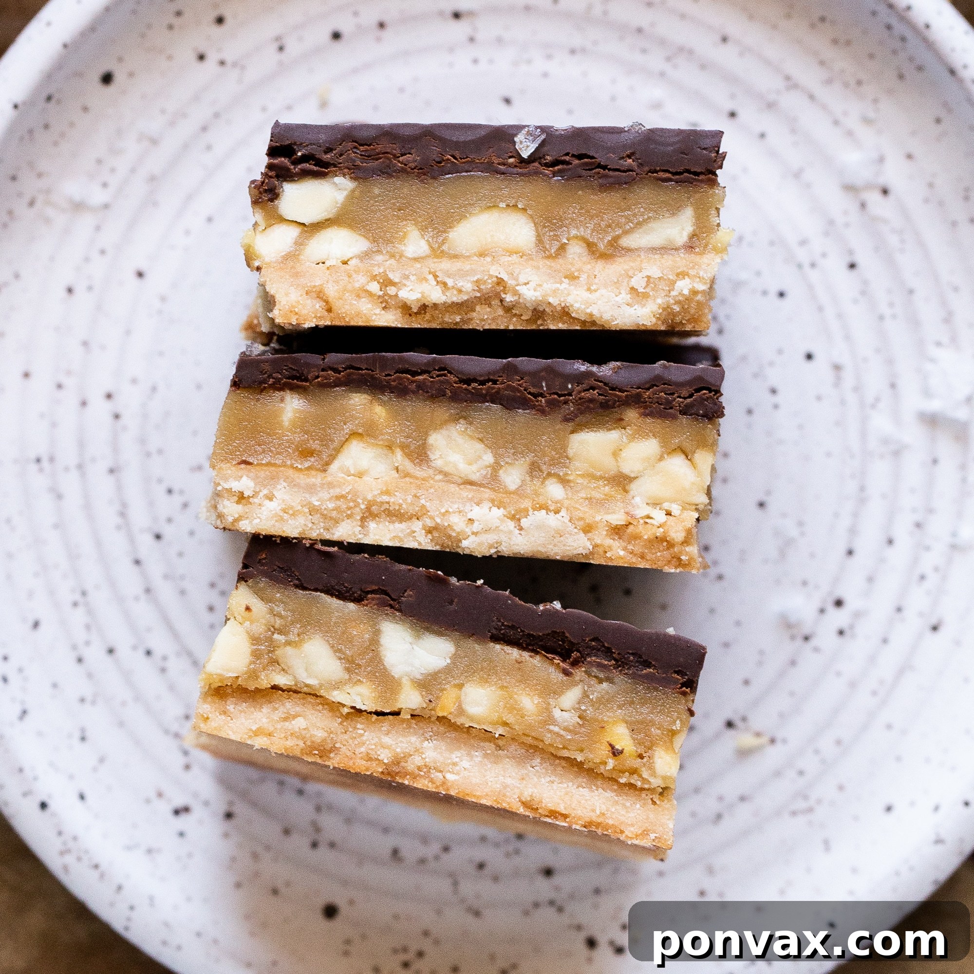 Vegan Super Bowl Feast: Over 50 Game Day Recipes 34 Calling all peanut butter lovers! These Gluten-Free Vegan Peanut Butter Twix Bars will knock your socks off. They have a layer of coconut flour shortbread, a quick no-cook peanut butter caramel, and a layer of dark chocolate.