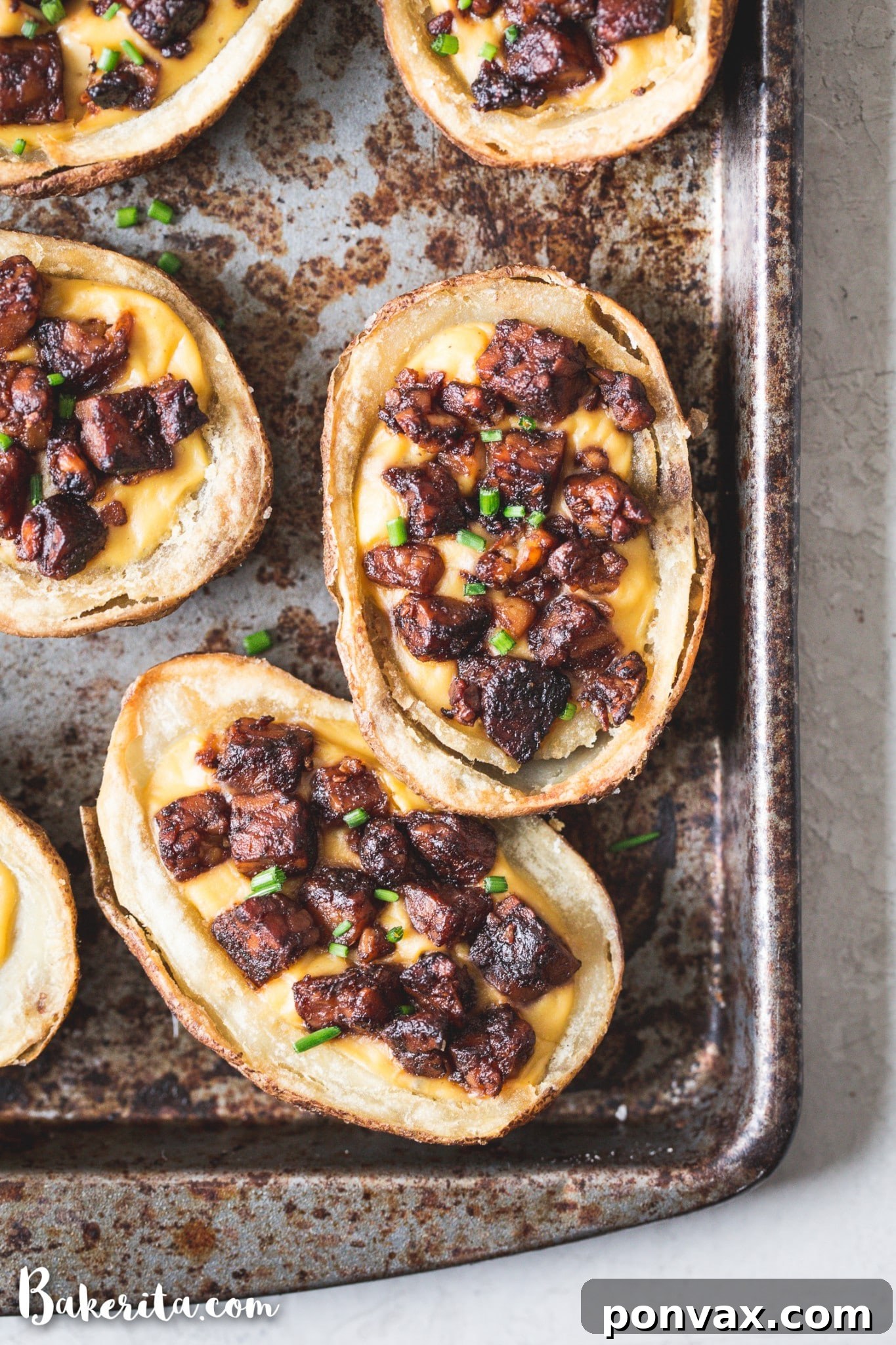 Vegan Super Bowl Feast: Over 50 Game Day Recipes 6 Vegan Tempeh Bacon Potato Skins are a healthier, baked version of the classic, filled with creamy vegan cheese sauce and smoky tempeh bacon bits. Perfect game day appetizer!