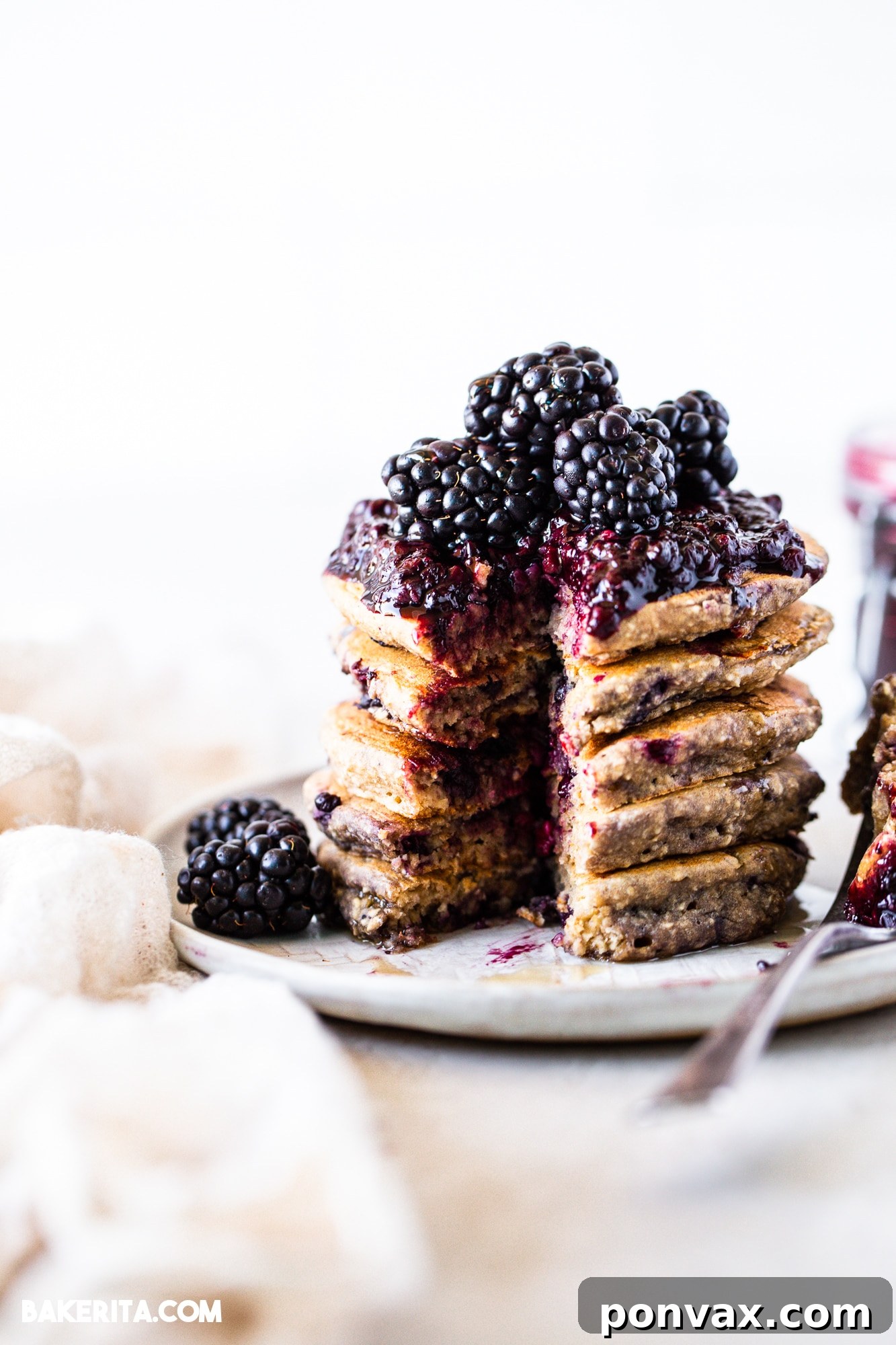 Berrylicious Vegan GF Pancakes 5 A close-up shot of raw gluten-free vegan pancake batter with blackberries gently folded in.