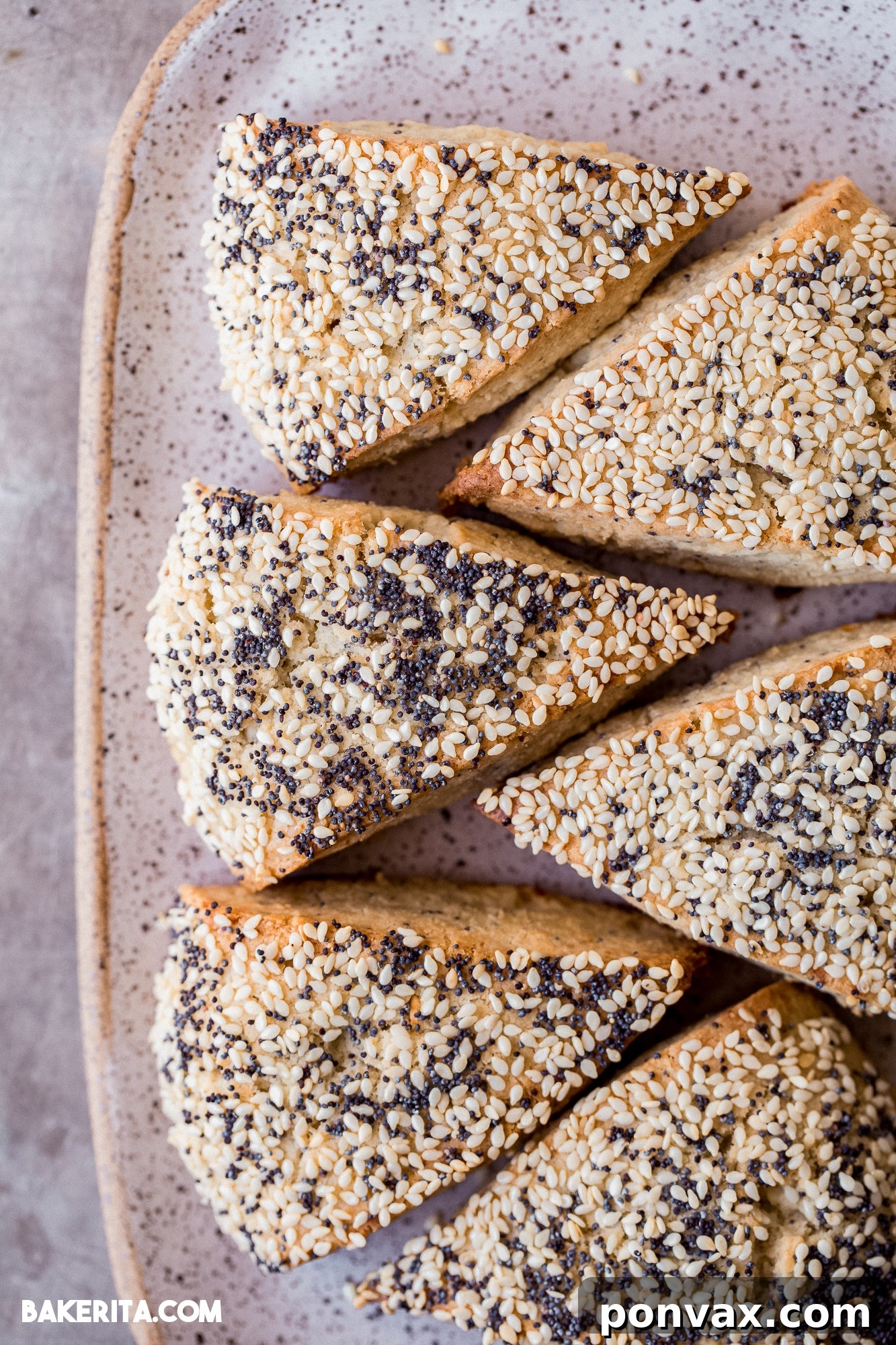 Gluten-Free Sourdough Scones cooling on a wire rack after baking, their perfectly golden crusts visible.