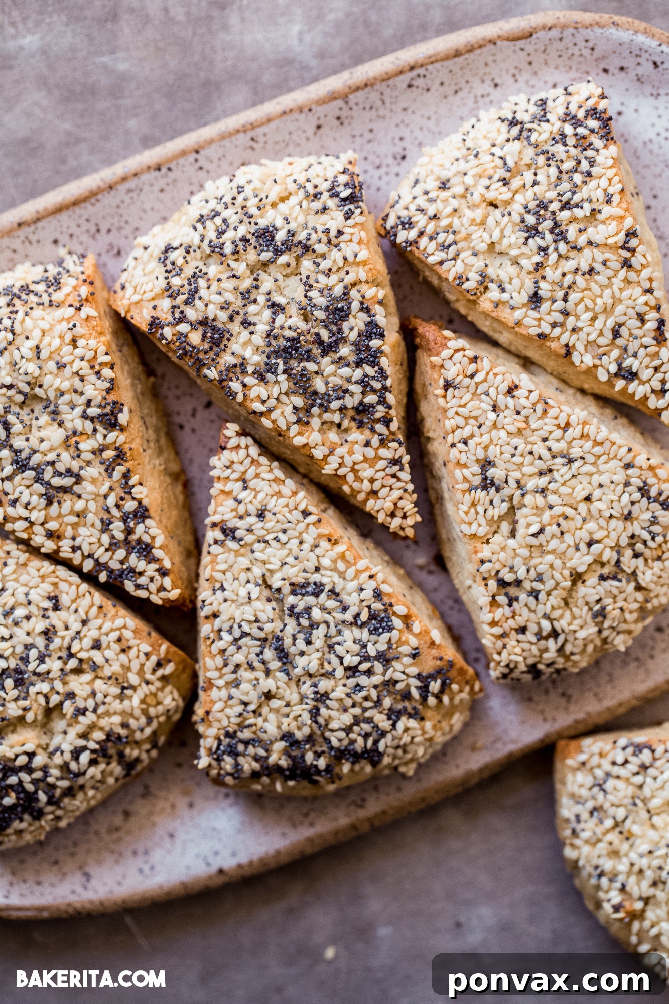 A beautifully arranged stack of golden-brown Gluten-Free Sourdough Scones, ready to be devoured or thoughtfully stored for later enjoyment.