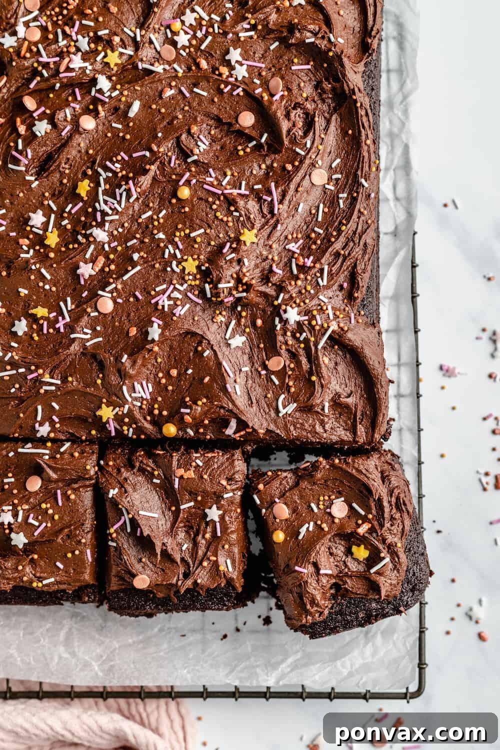 Classic vegan chocolate sheet cake with creamy vegan chocolate buttercream by Jessica in the Kitchen.